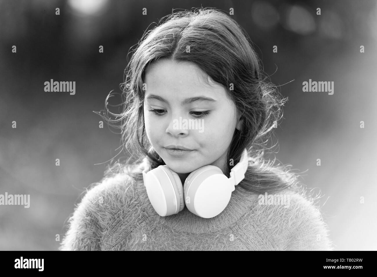 Cute melomane. Little girl child wearing headphones. Happy child ...