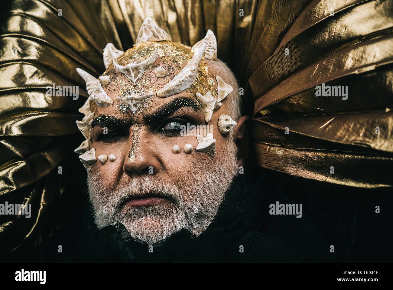Enchanted cyclope with thorns and warts on face. Blind sorcerer over ...
