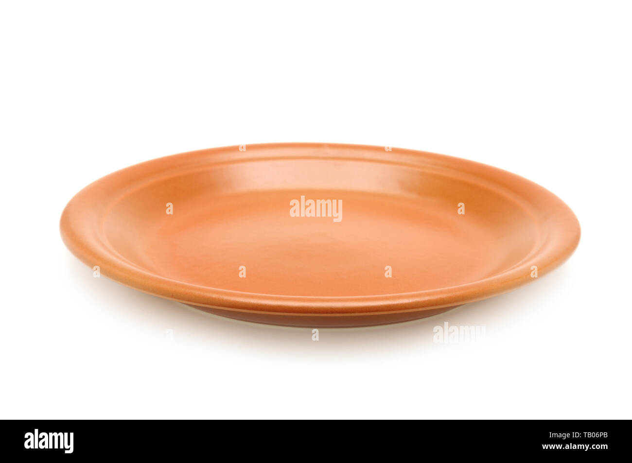 Ceramic plate isolated on a white background Stock Photo - Alamy