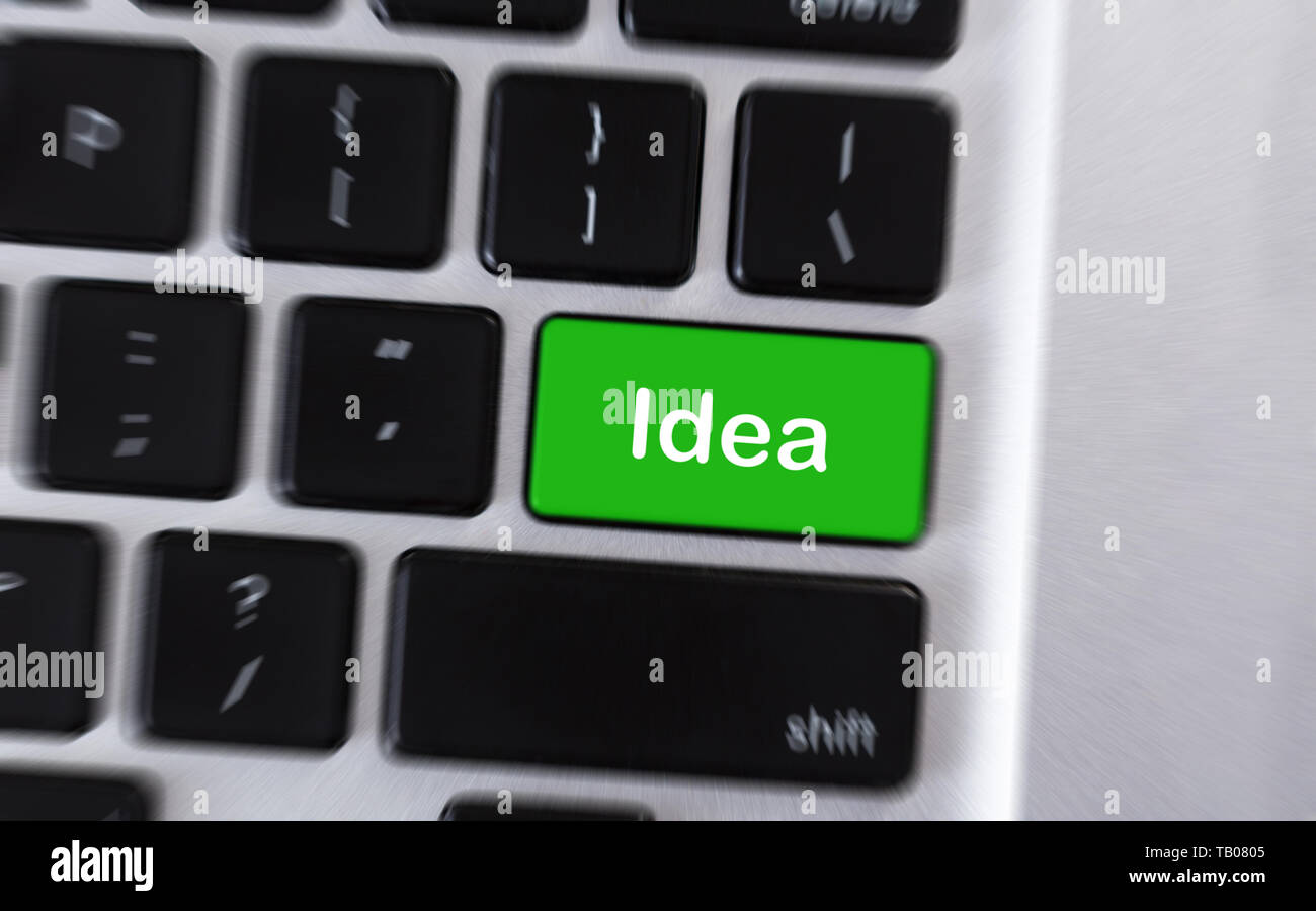 Text Idea on green button of computer keyboard Stock Photo