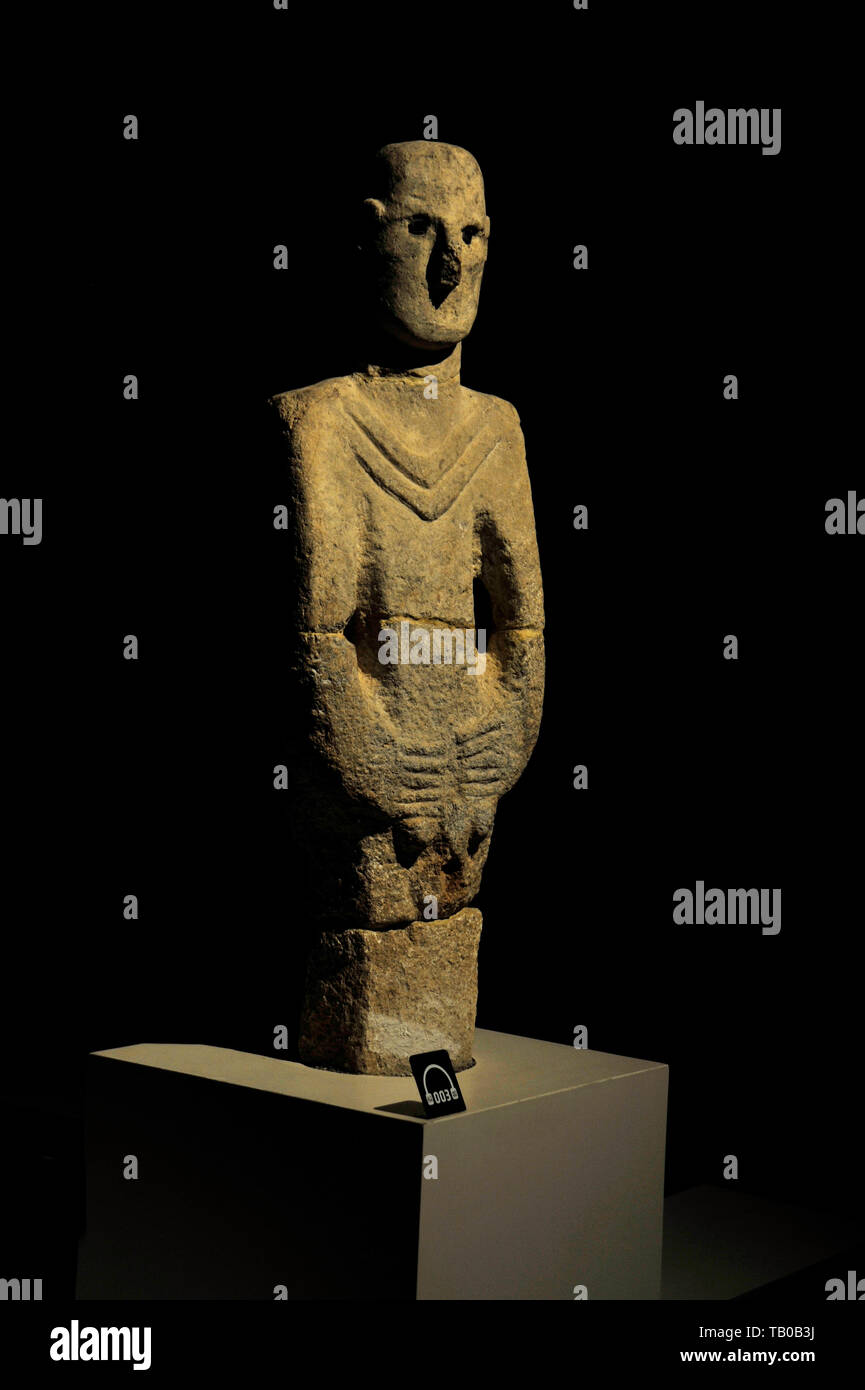 ANCIENT STONE CARVING OF A STANDING FIGURE, POSSIBLY THE OLDEST ON EARTH  from Gobekli Tepe on display in museum in Sanliurfa, Turkey Stock Photo
