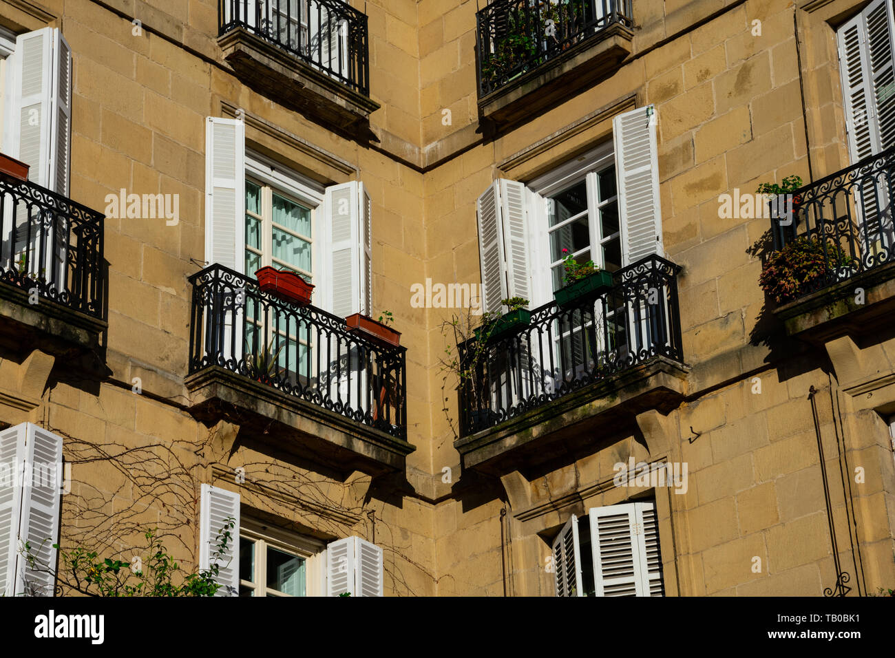 Building with balconies at The Plaza Nueva or Plaza Barria (New Square) of Bilbao, a monumental square of Neoclassical style built in 1821. Bilbao, Sp Stock Photo