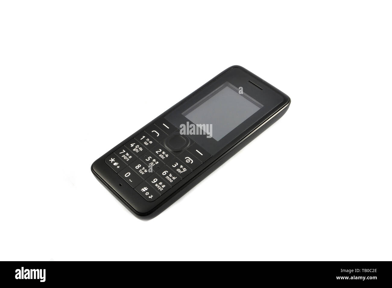 Black telephone / Old model mobile phone isolated on white background Stock Photo