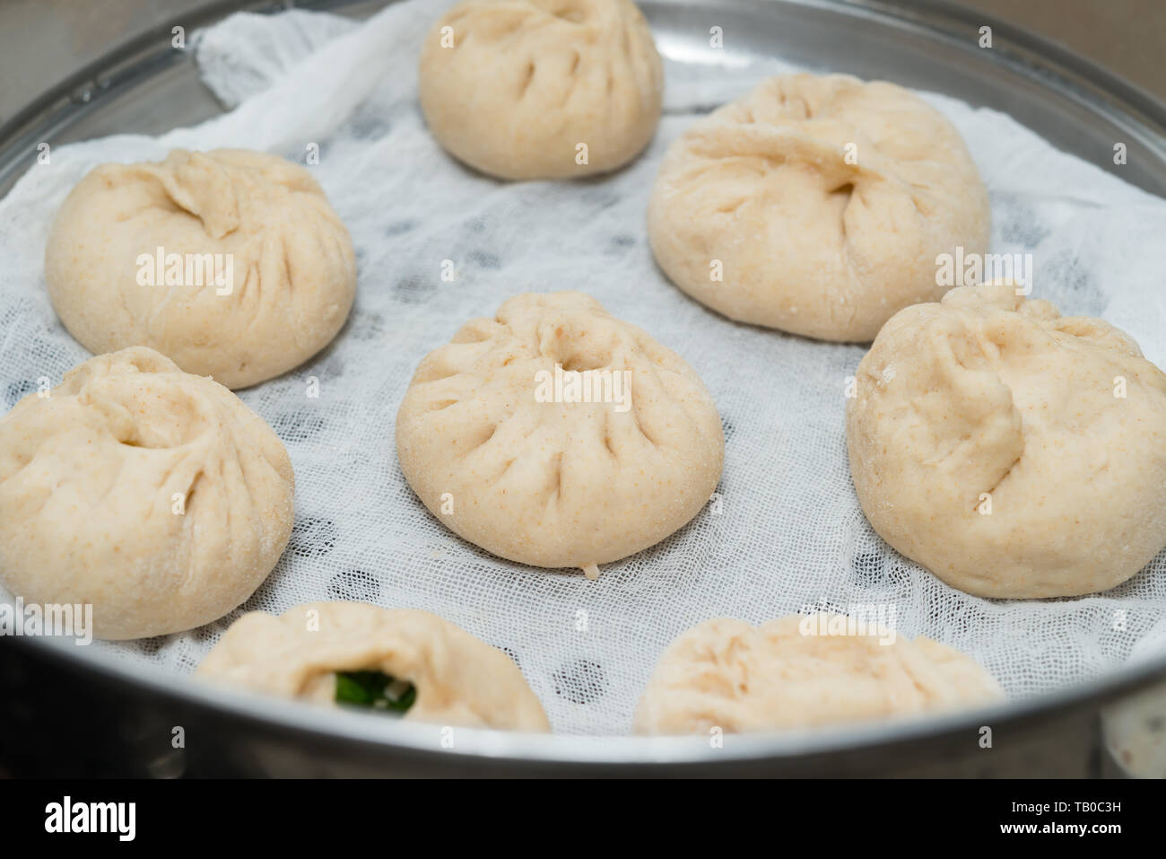cooking home made traditional Chinese dumplings Stock Photo Alamy