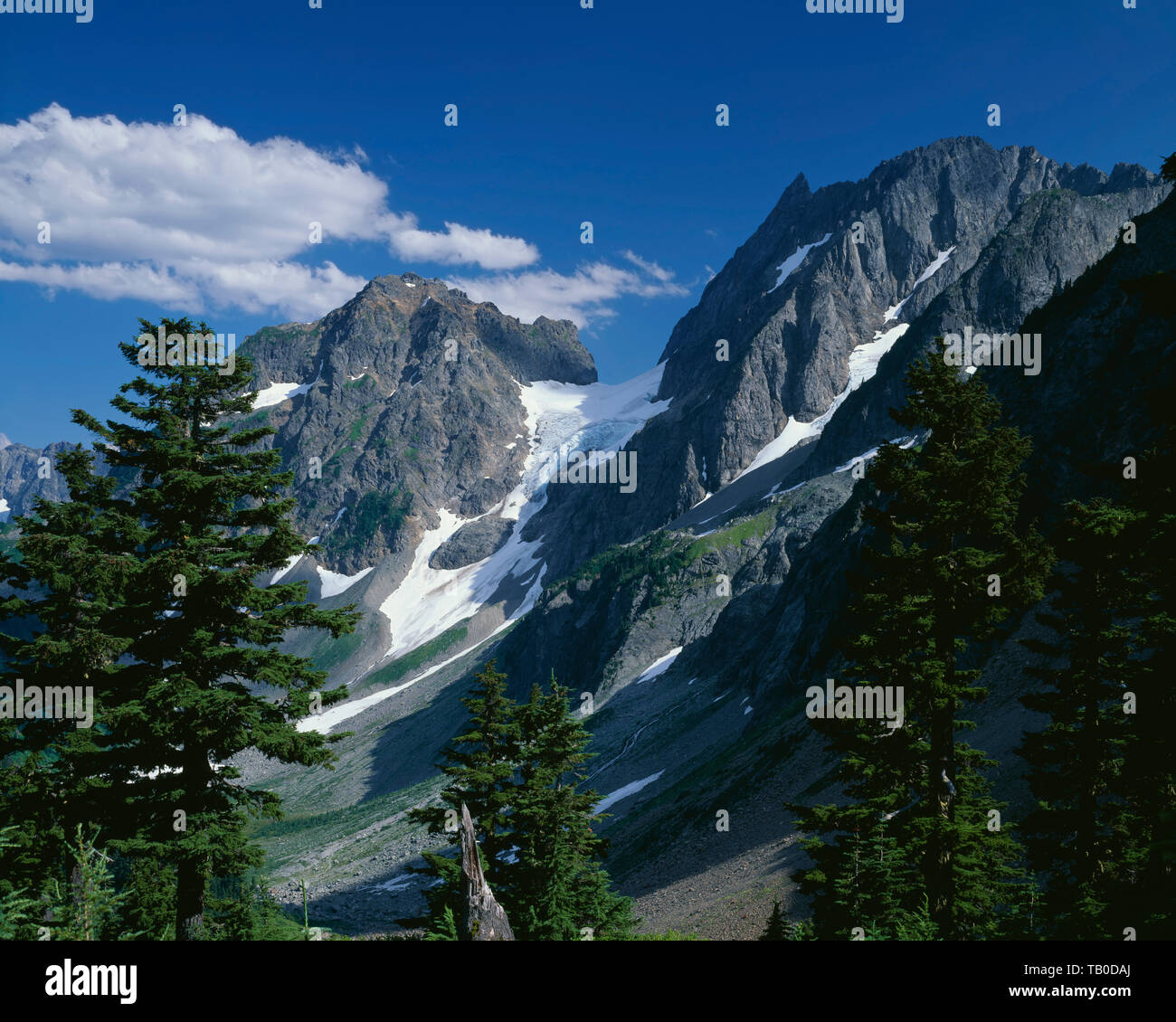 USA, Washington, North Cascades National Park, Pelton Peak (left) and Magic Mountain (right) tower above Pelton Basin. Stock Photo