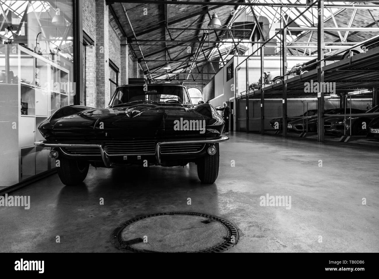 BERLIN - MAY 11, 2019: Sports car Chevrolet Corvette Sting Ray (C2). Black and white. 32th Berlin-Brandenburg Oldtimer Day. Stock Photo