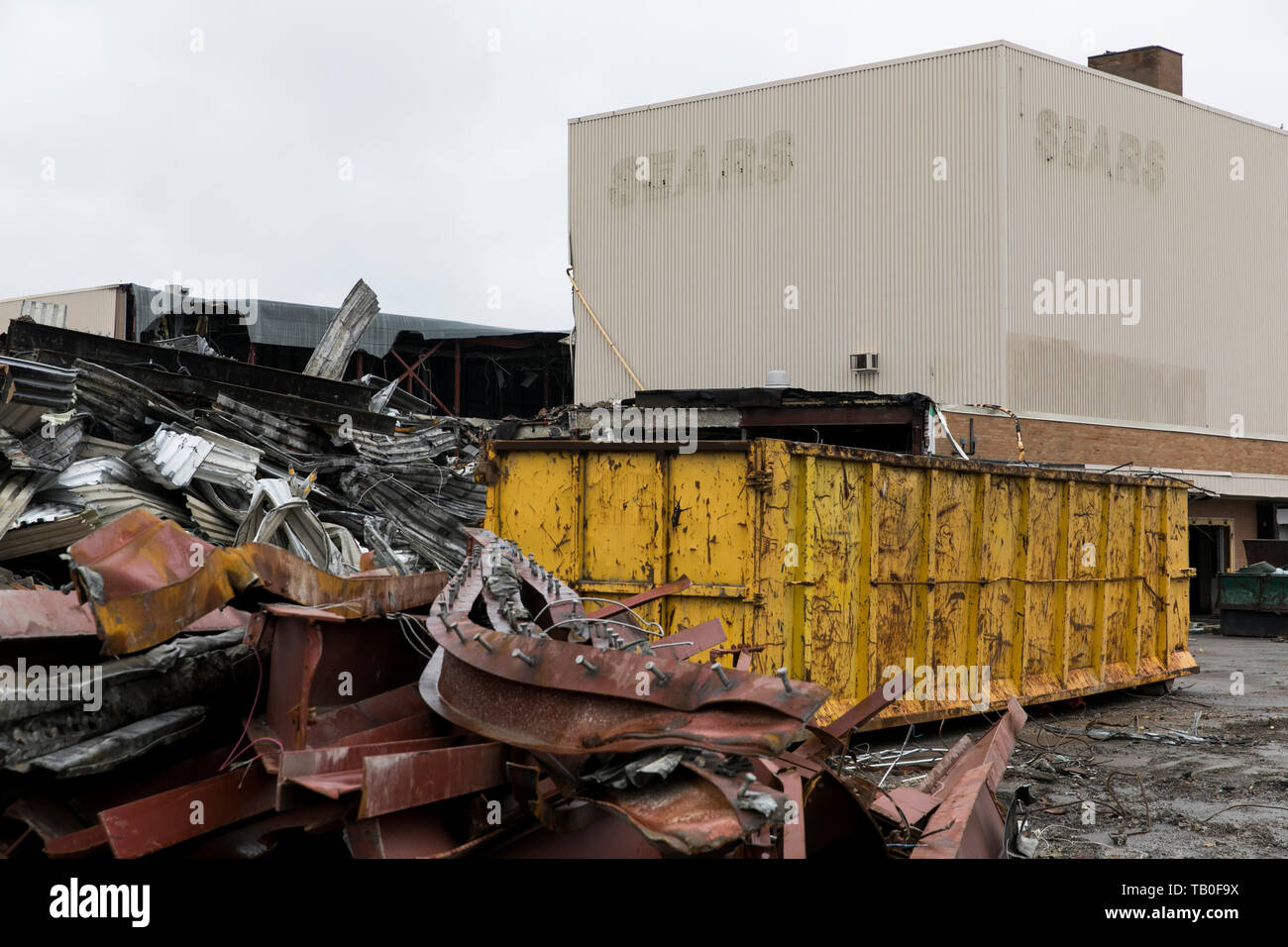 Debris surrounds the site of a closed Sears retail store during its demolition in Ottawa, Ontario, Canada, on April 20, 2019. Stock Photo