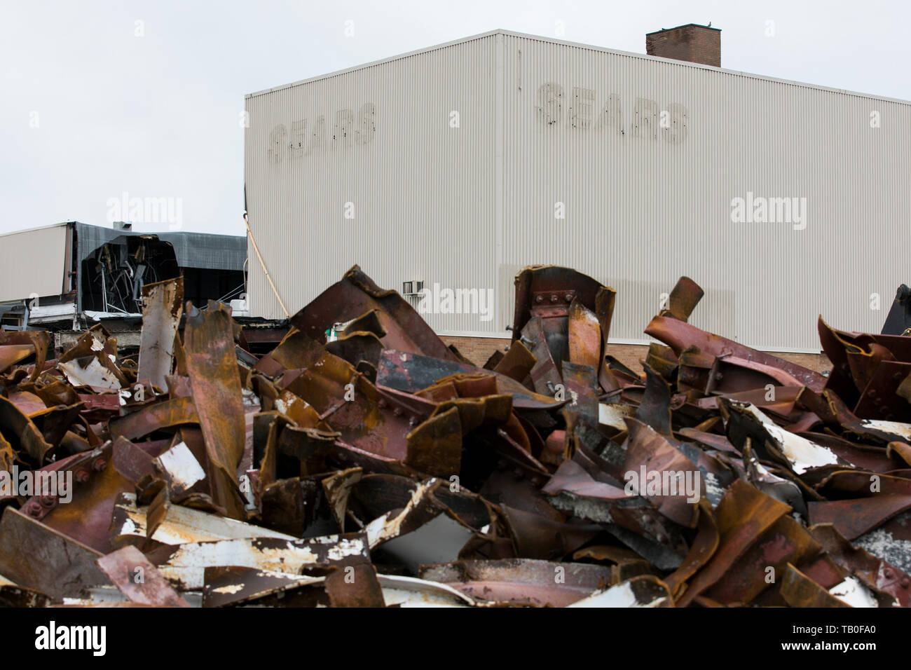 Debris surrounds the site of a closed Sears retail store during its demolition in Ottawa, Ontario, Canada, on April 20, 2019. Stock Photo