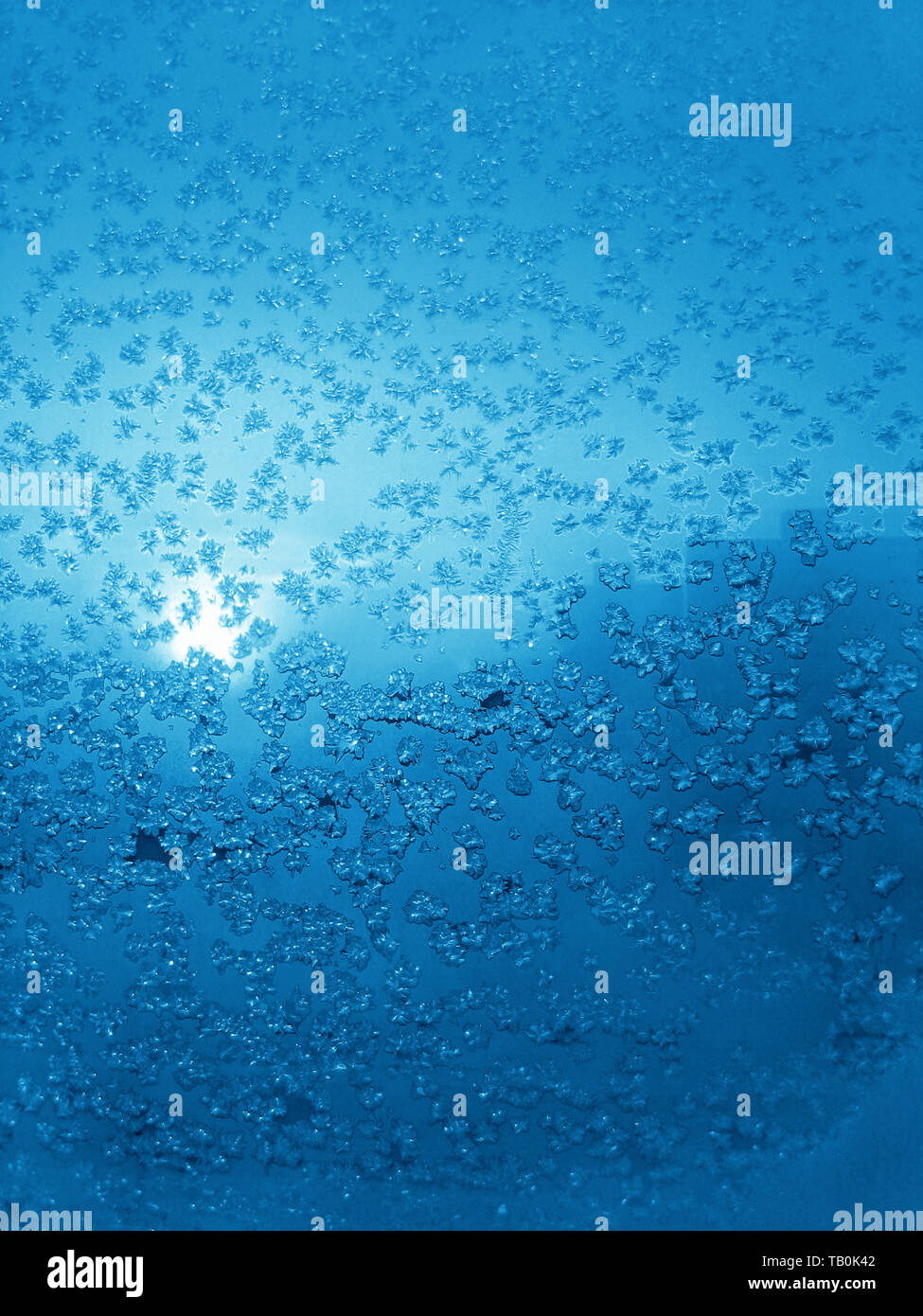 Frosty natural pattern and sunlight on winter window Stock Photo - Alamy