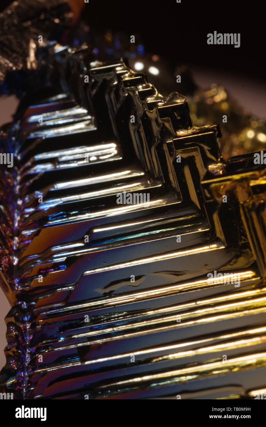 Bismuth Crystal against a Black Background Stock Photo - Alamy
