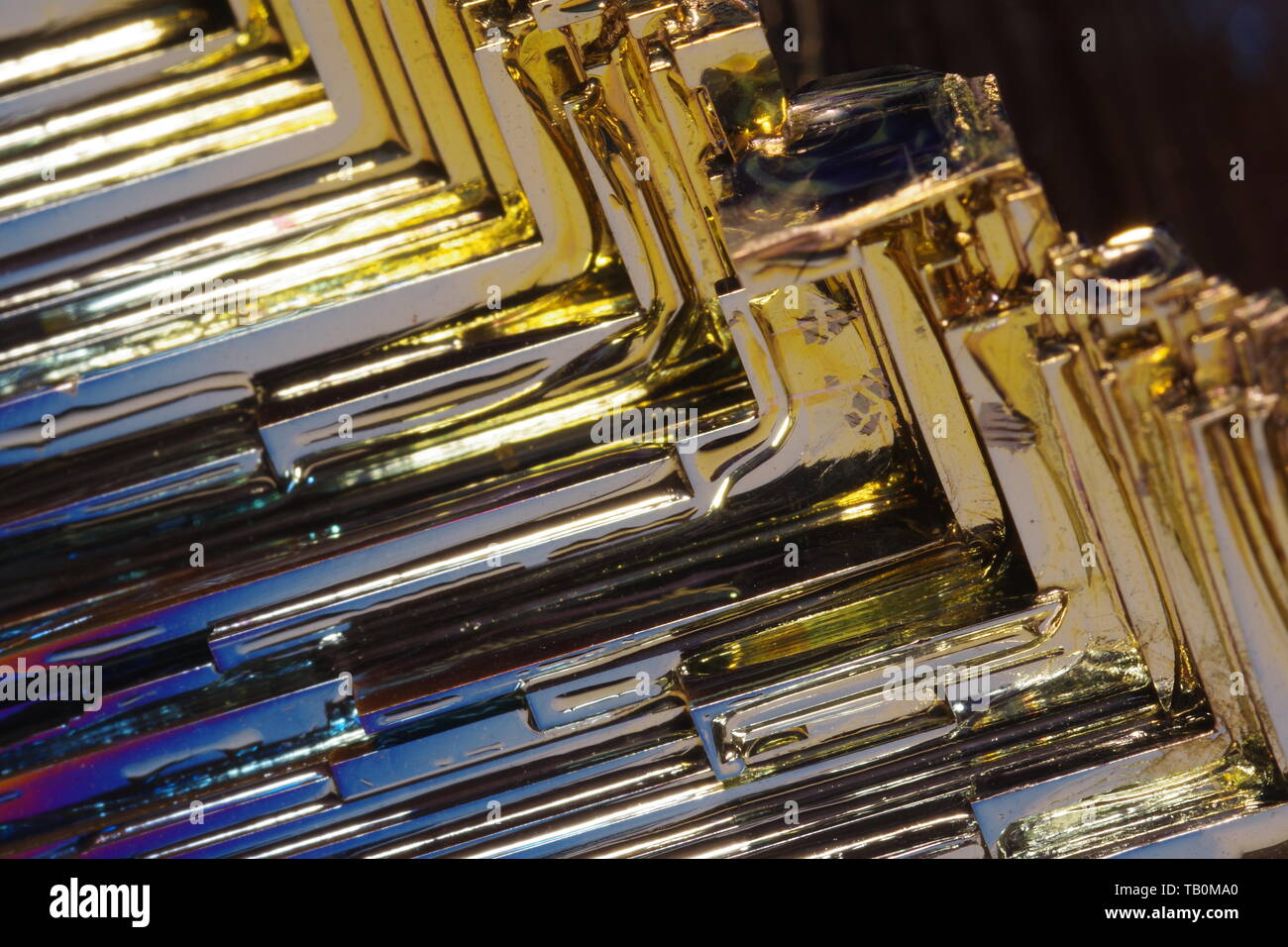 Bismuth Crystal against a Black Background Stock Photo - Alamy