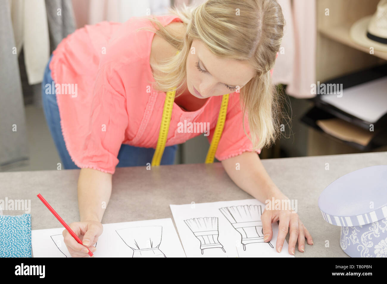Young woman tailor isolated hi-res stock photography and images - Alamy