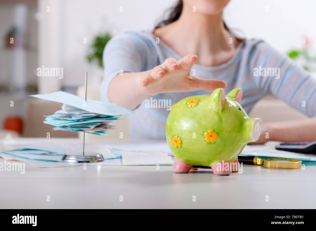 Young woman in budget planning concept Stock Photo