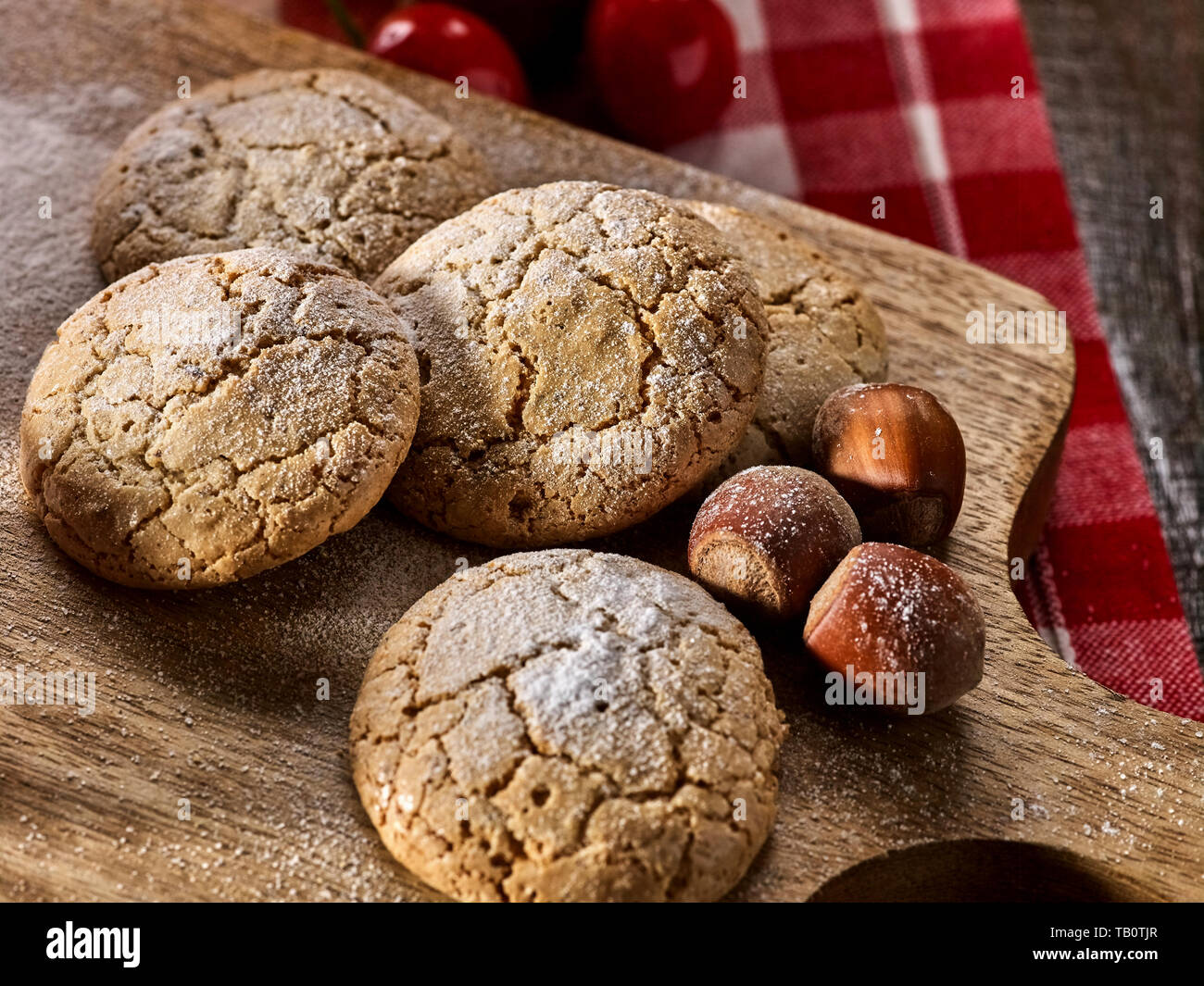Oatmeal cookies and nut cookies with crack pattern on cutting board Stock Photo