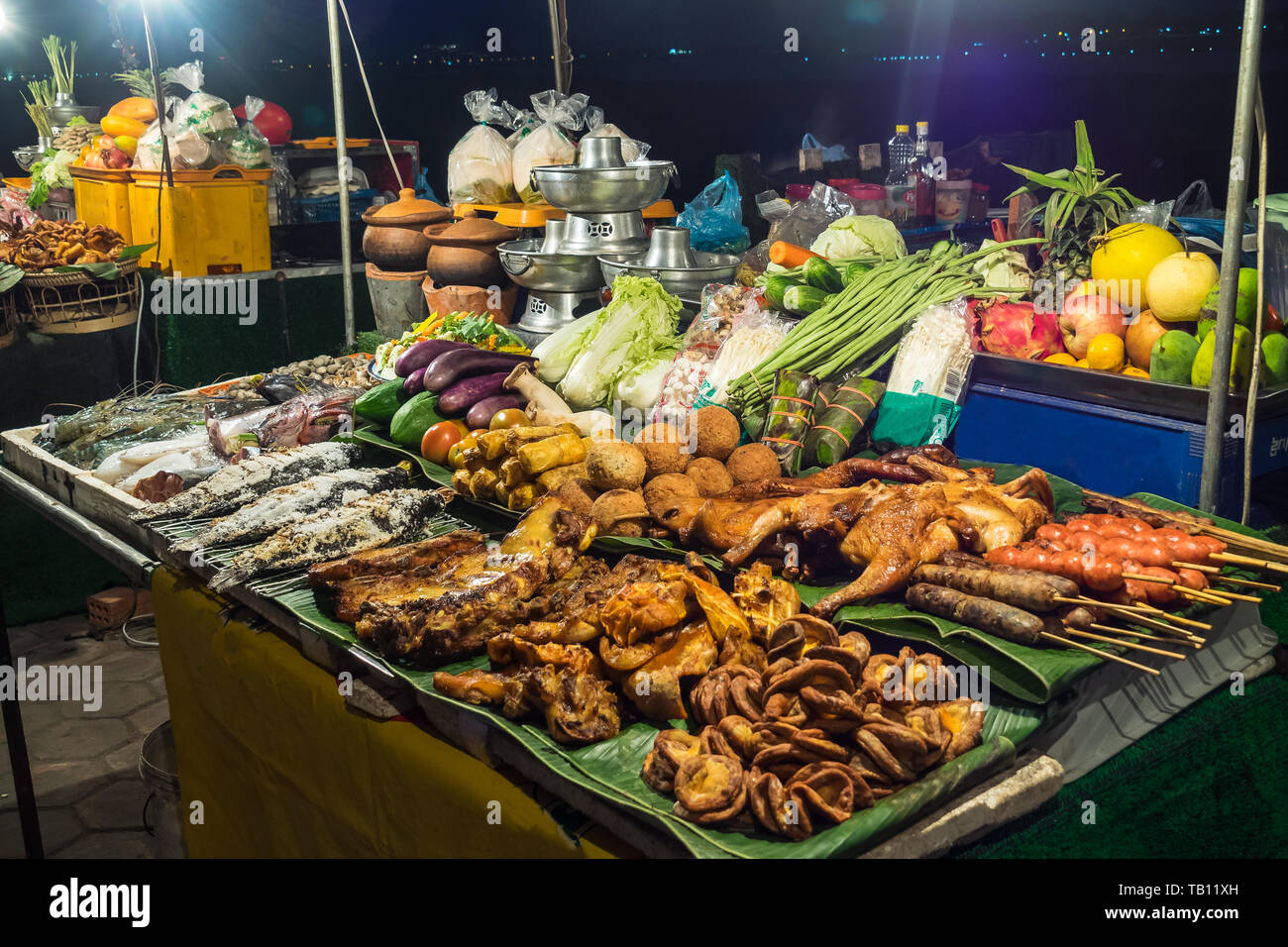Asian food market in Vientiane in Laos in Southeast Asia Stock Photo