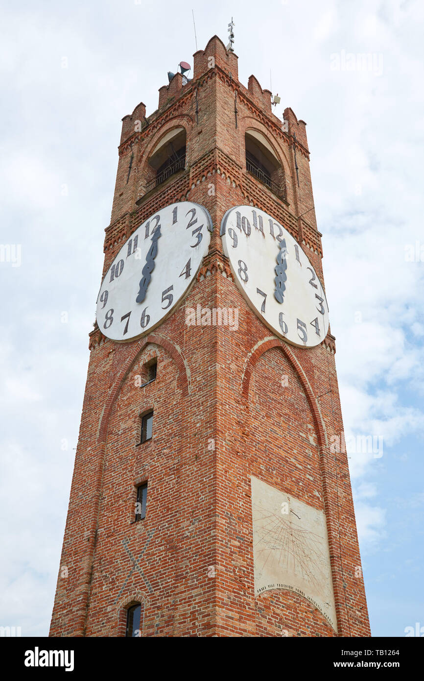 MONDOVI, ITALY - AUGUST 18, 2016: Belvedere ancient clock tower low angle view in a summer day in Mondovi, Italy. Stock Photo