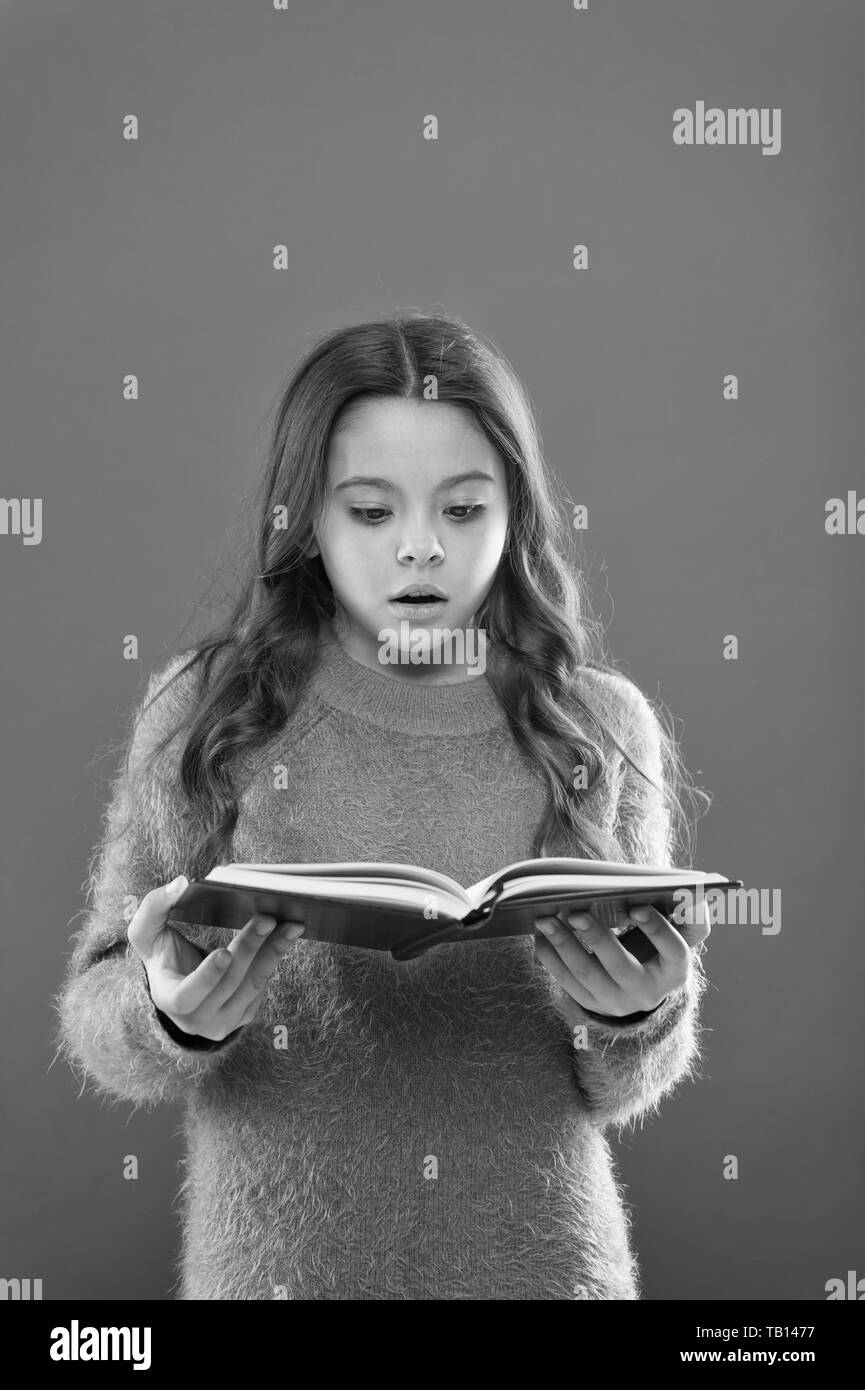 childhood happiness. Family. Kid fashion. Happy little girl with long hair. childrens day. Portrait of happy little child. Small girl child. Hairdresser for kids. So many questions. school girl. Stock Photo