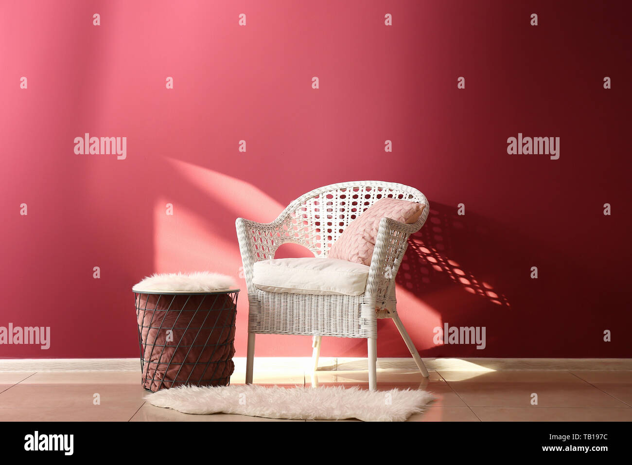 Soft Armchair With Table Near Color Wall In Living Room Stock Photo Alamy