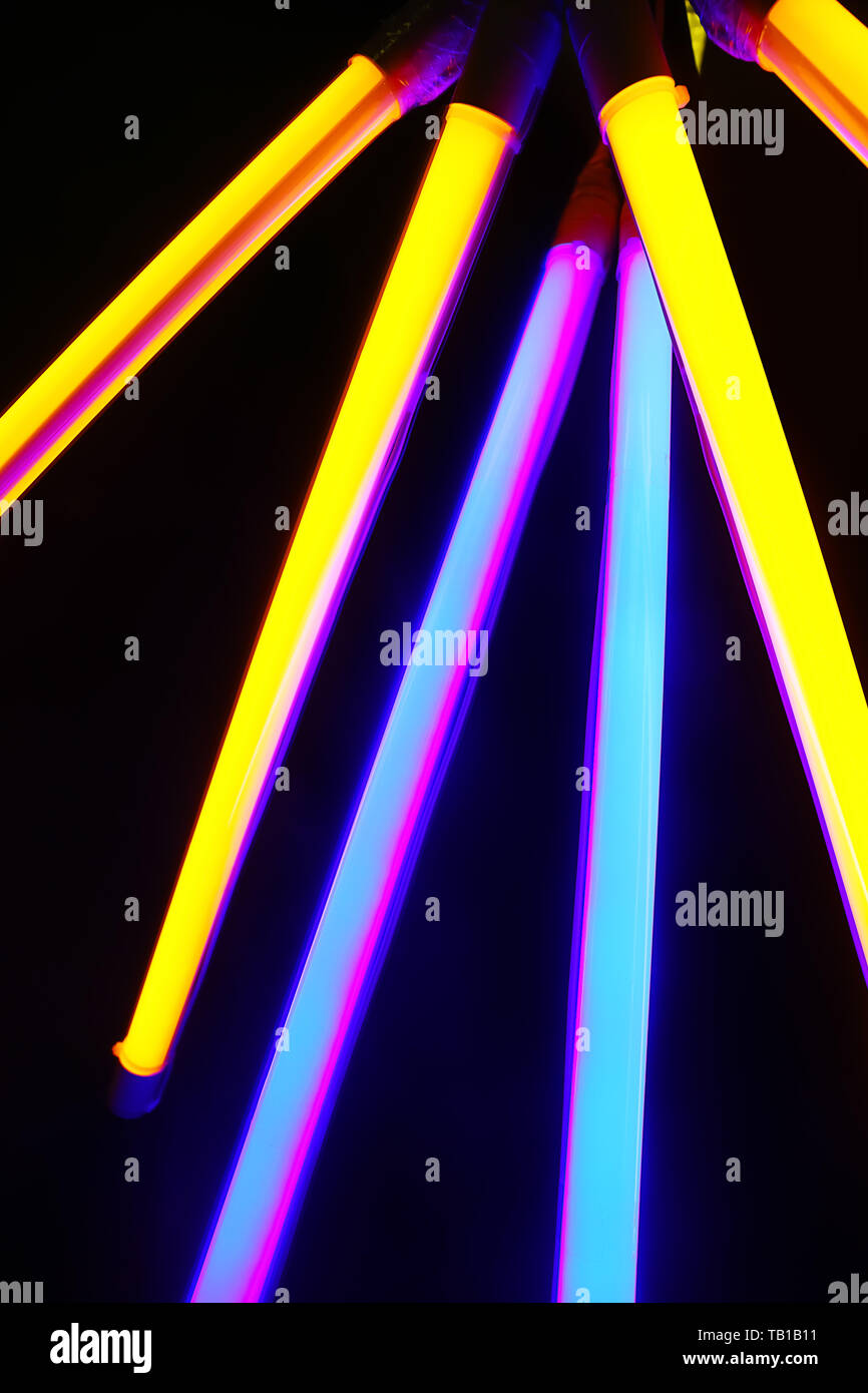 Colorful neon lamps on dark background Stock Photo Alamy