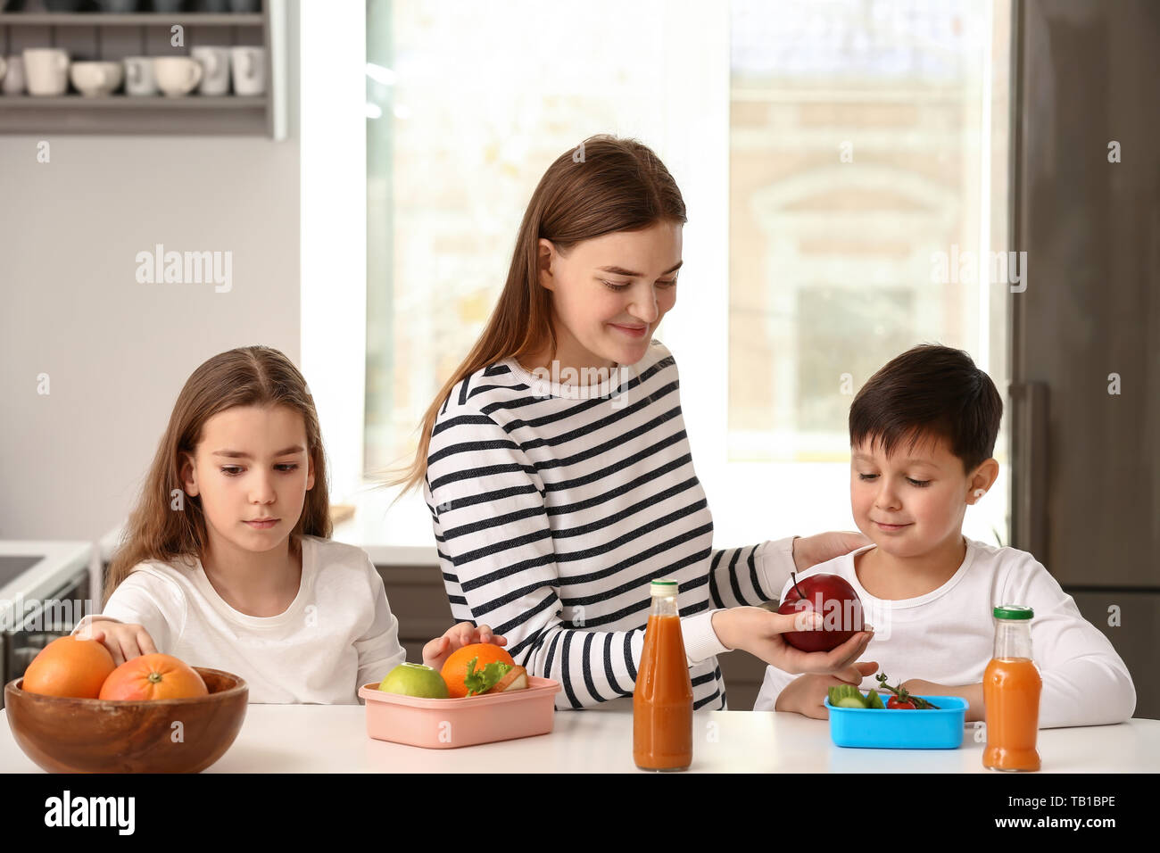 mother feeding child