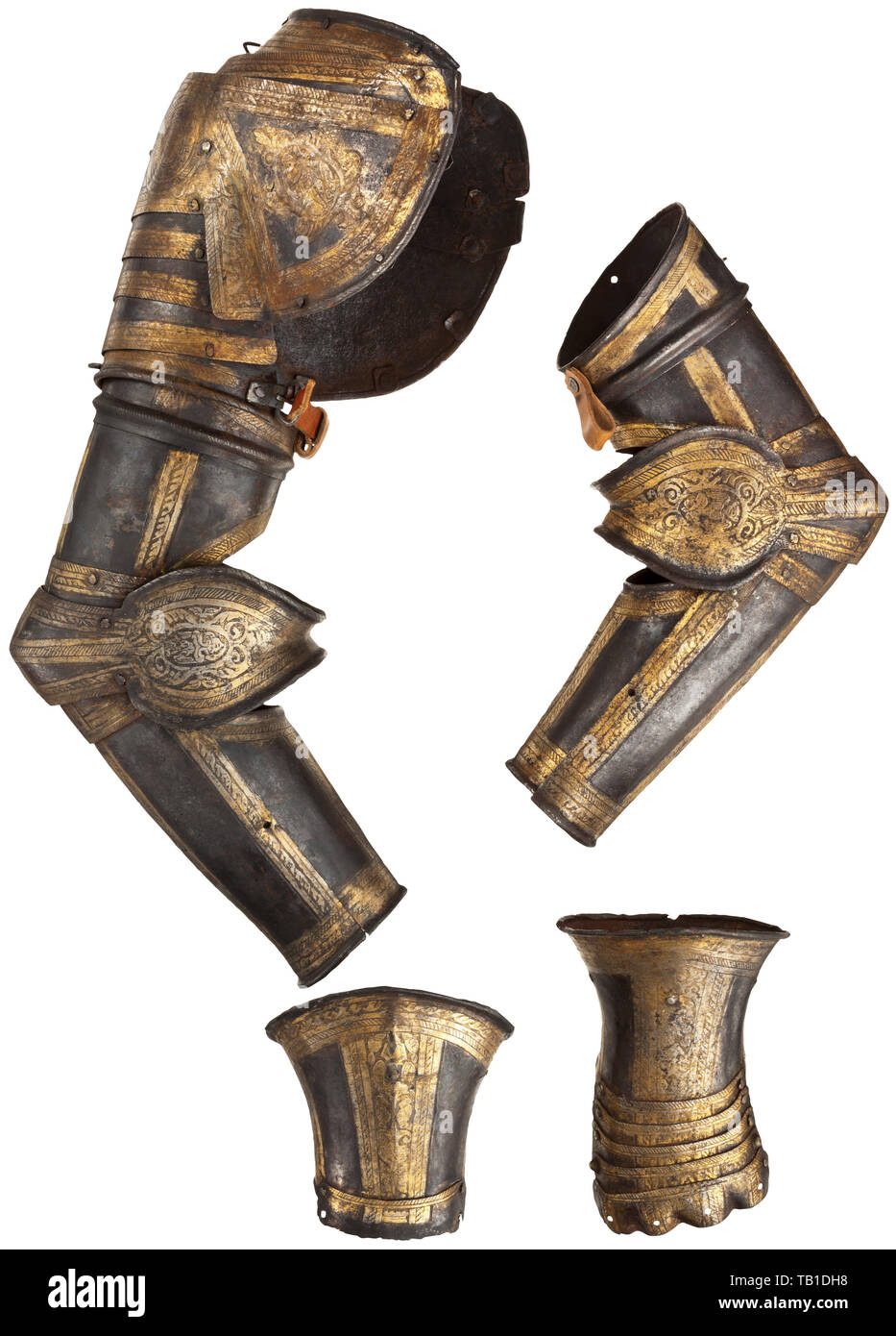 A pair of North Italian etched and gilt arm defences and gauntlets, circa 1580-90, Comprising a full defence for the right arm, with large spaulder of seven lames attached to the turner by a turning-pin on the outer face and by a strap on the inner face, tubular upper-cannon, bracelet couter, and hinged lower-cannon, the defence for the left arm identical but now missing the spaulder, and each with a pair of gauntlets en suite with the arms. etched throughout with cabled bands of trophies, monsters, masks and grotesques on a contrasting stippled , Additional-Rights-Clearance-Info-Not-Available Stock Photo