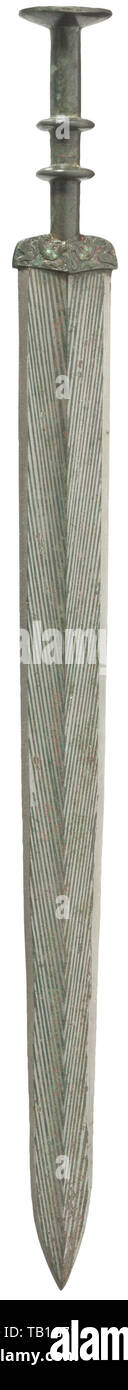 A Chinese bronze sword, Warring States period, Double-edged blade of white bronze with double fullers on both sides and medial ridge, the surface with herringbone pattern inlaid in yellow bronze, the blade mounting decorated in fine relief and set with eight small turquoises, the grip segmented by two girdles, disk-shaped pommel adorned with ornamental pattern in relief. Fine patina. Length 52 cm. Cf. C.H. Wang Collection, Shang and Zhou Chinese Bronze Weaponry, Taiwan, 1983. Provenance: Hermann Historica, auction 46, lot 767. China, Chinese, his, Additional-Rights-Clearance-Info-Not-Available Stock Photo