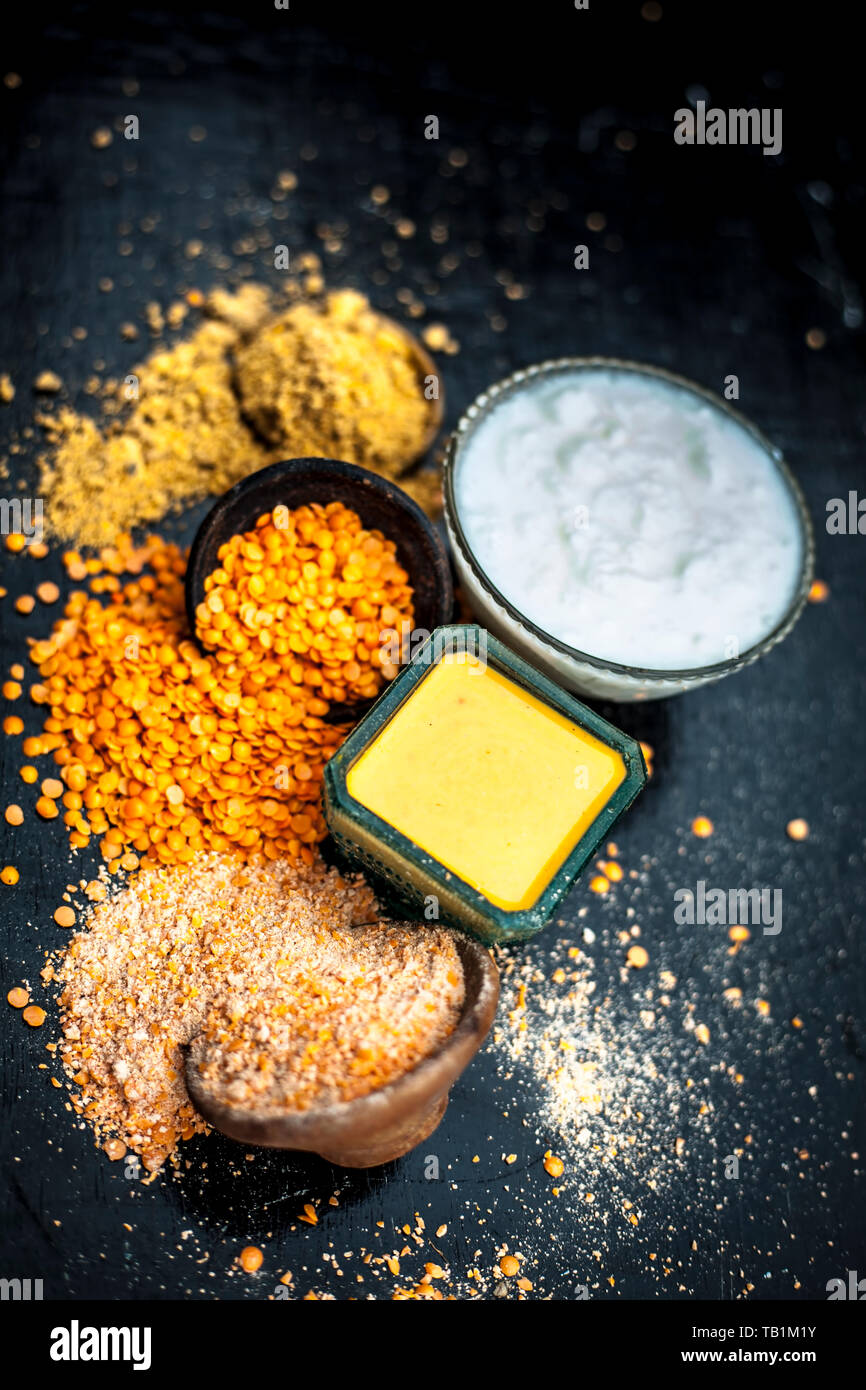 Close Up Of Yogurt Or Curd Face Pack With Honey Lemon Juice Turmeric Powder For Acne Skin On Wooden Surface In A Glass Container With Raw Lemon And Tu Stock Photo Alamy