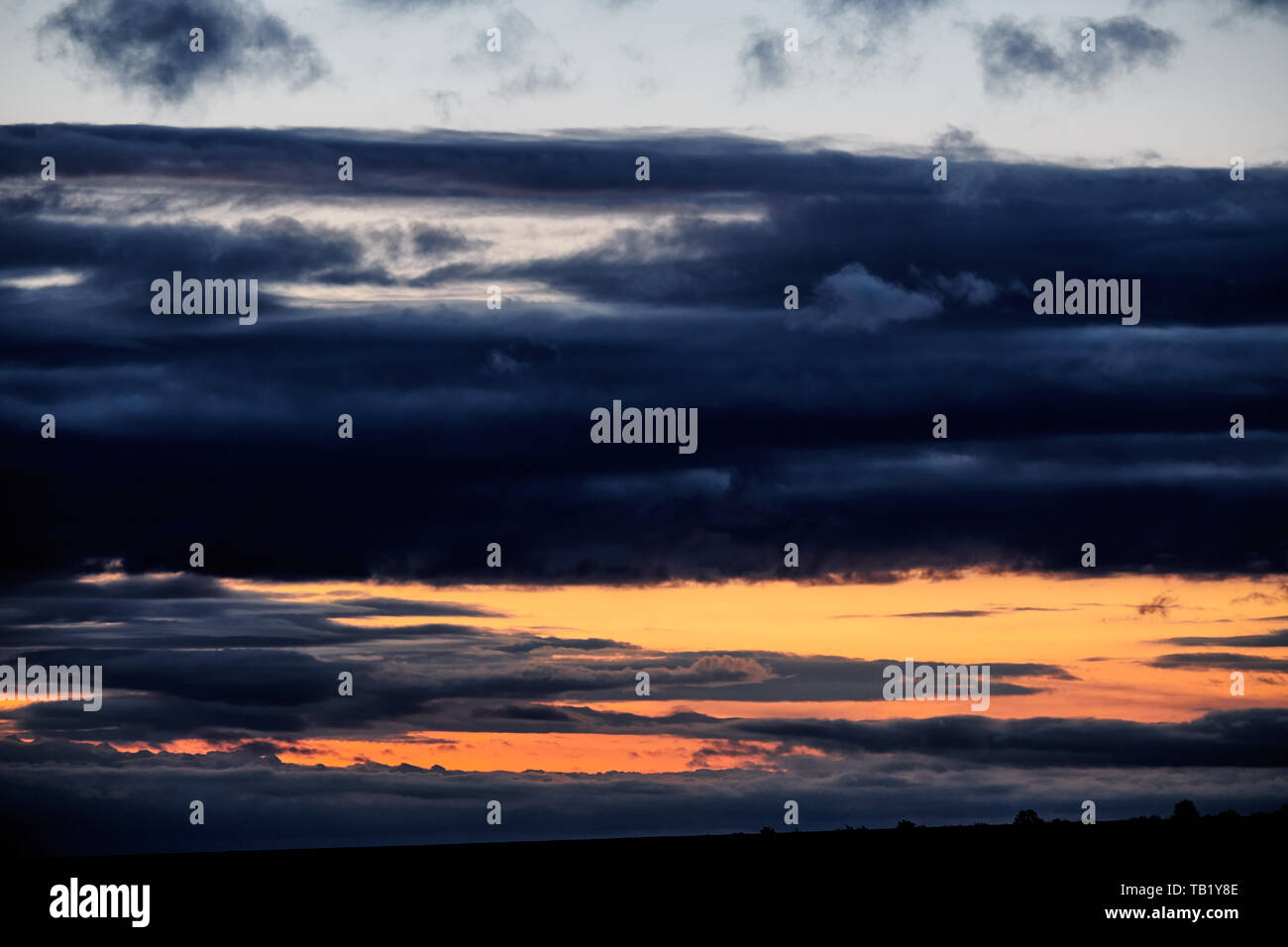 Dark stormy sky with clouds at night Stock Photo - Alamy