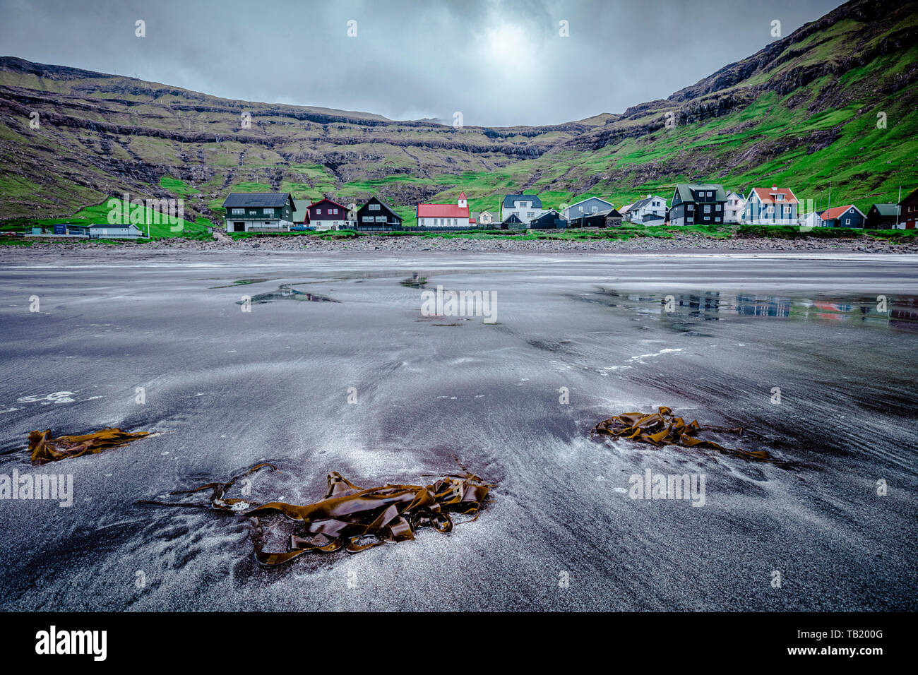 View from the beach of the fishing town of Tjørnuvík, in the Faroe Islands. Stock Photo