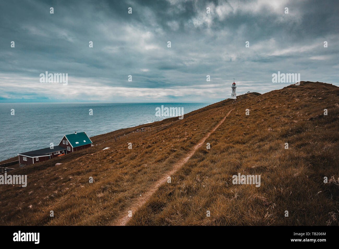 famous lighthouse on the island of Mykines, Faroe. Stock Photo