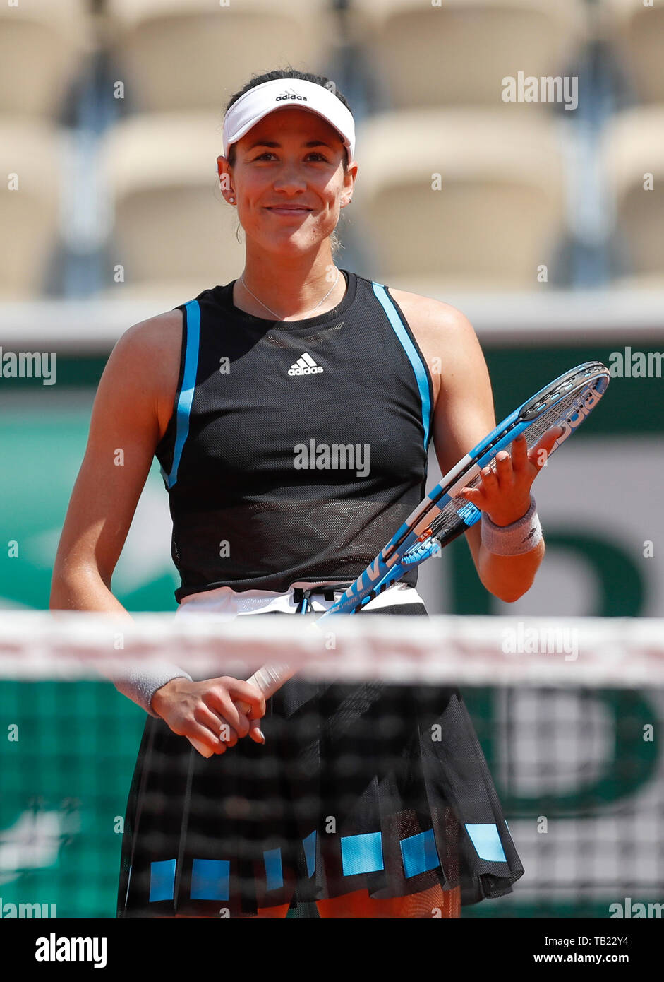 Paris. 29th May, 2019. Spain's Garbine Muguruza celebrates after winning  the women's singles second round match with Sweden's Johanna Larsson at  French Open tennis tournament 2019 at Roland Garros in Paris, France