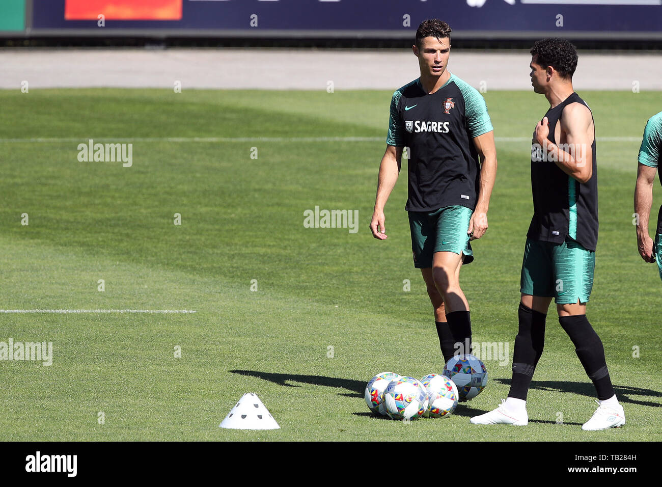 Oeiras. 29th May, 2019. Portugal's Cristiano Ronaldo (L) and Pepe attend a training session in Oeiras, Portugal, May 29, 2019, as part of preparations for the final stage of the UEFA Nations League. Credit: Pedro Fiuza/Xinhua/Alamy Live News Stock Photo