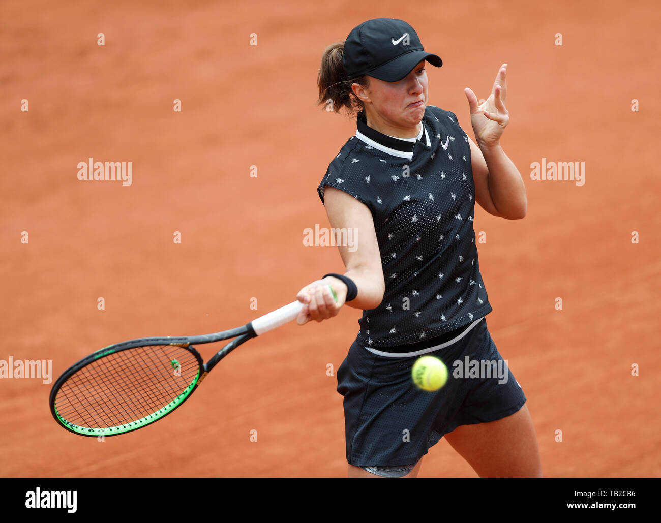 Paris Paris. 30th May 2019. Iga Swiatek of Poland returns the ball during the women s singles second round match with Wang Qiang of China at French Open tennis tournament 2019 at Roland