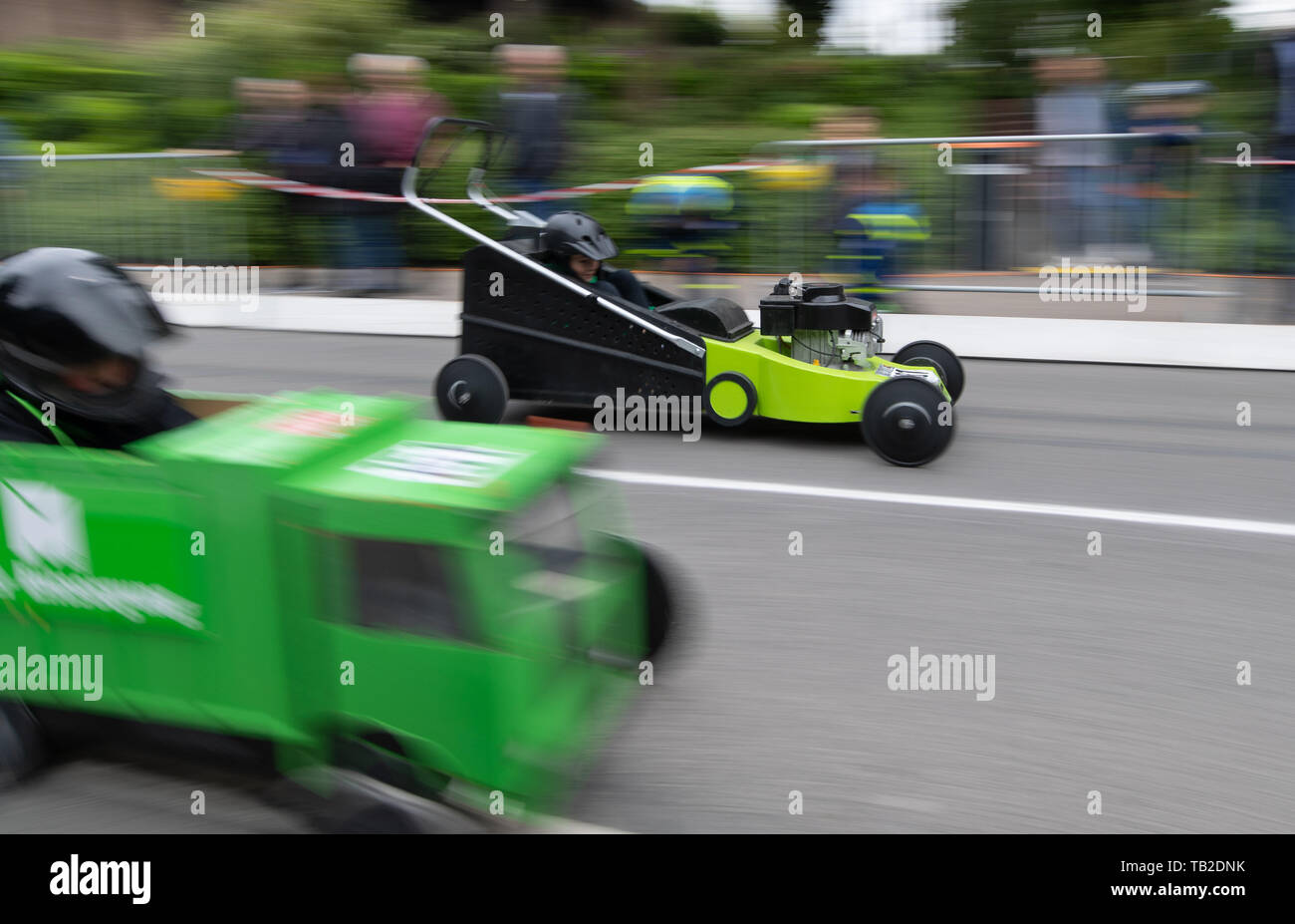 Osnabrück, Lower Saxony, Germany A soapbox in the shape of a lawn mower drives on a road during a soapbox race Xxx Photo