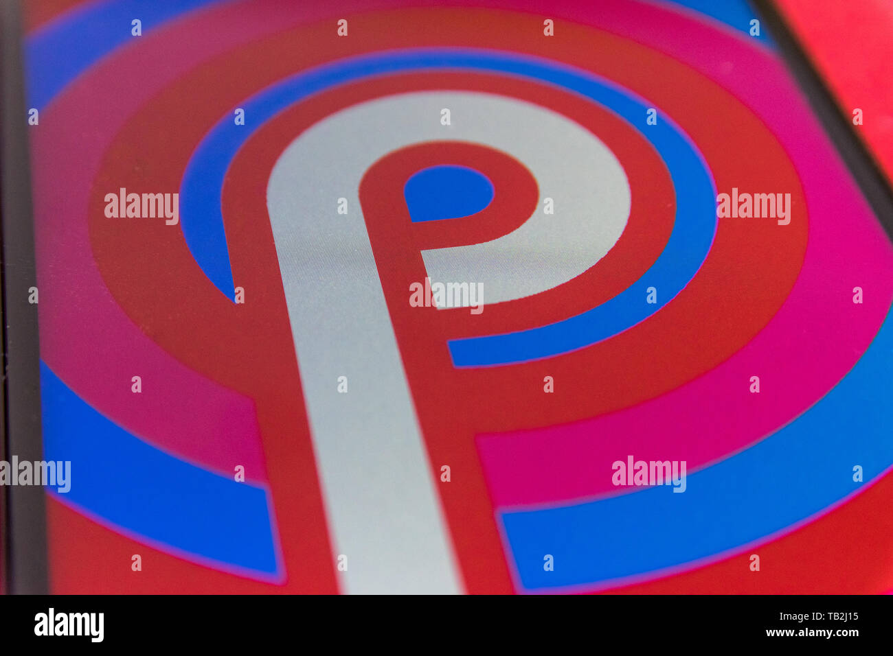 Cluj, Romania - May 13, 2019: Android Pie logo on a phone screen. It is the ninth major release and the 16th version of the Android mobile operating s Stock Photo