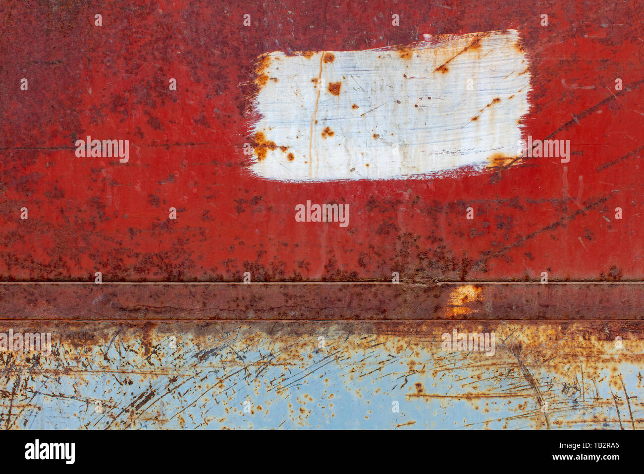 Scratch and rust markings on old metal wall Stock Photo