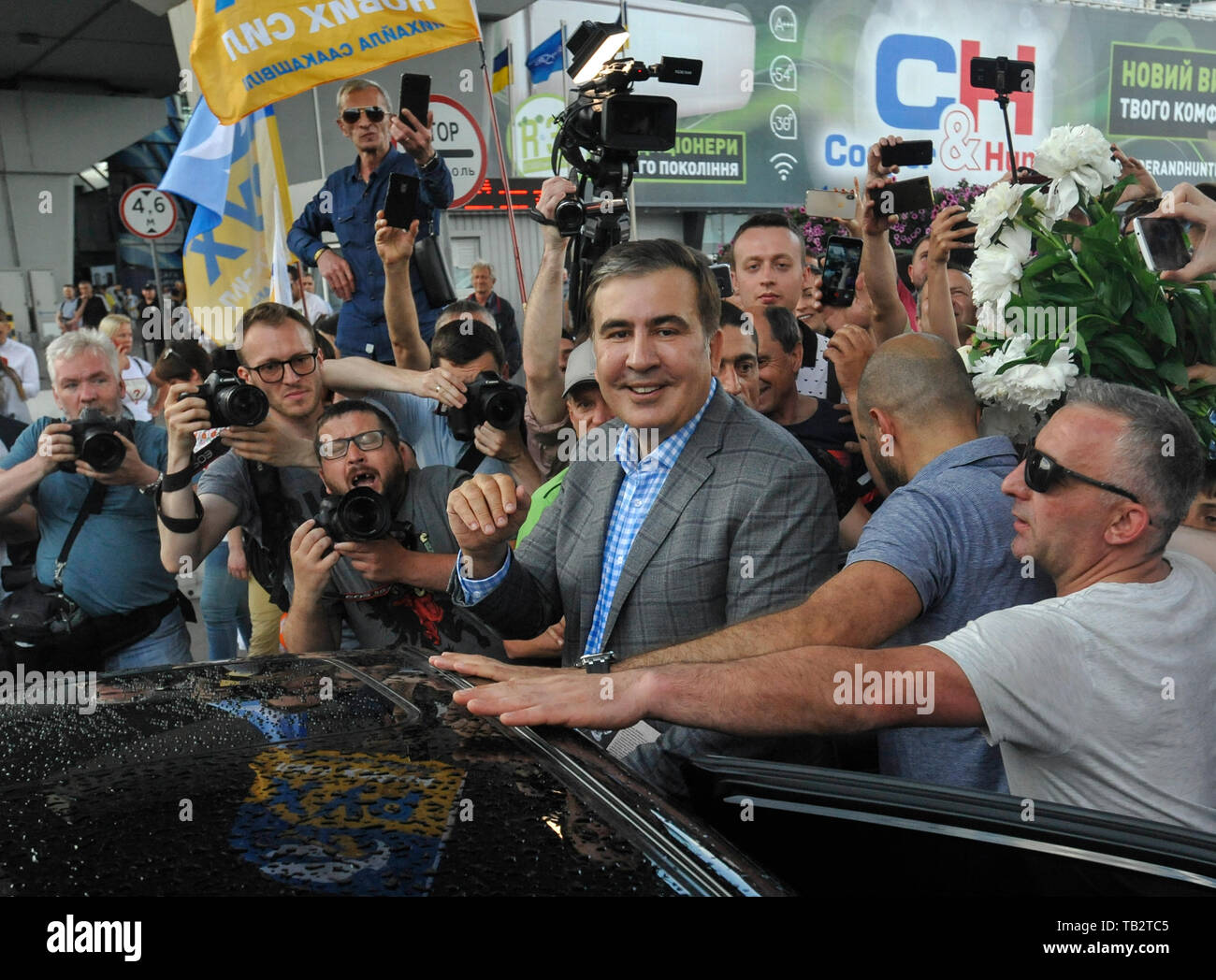 Former Georgian president Mikheil Saakashvili seen being welcomed by his supporters after returning to Ukraine at Boryspil airport in Kiev.  President Volodymyr Zelensky restored Mikheil Saakashvili’s Ukrainian citizenship after he was stripped by a decree of former Ukraine's president Petro Poroshenko in July 2017. Stock Photo