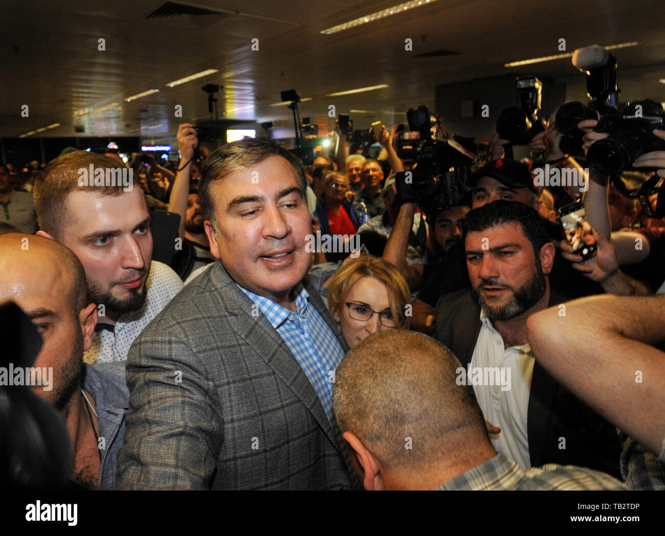 Former Georgian president Mikheil Saakashvili seen being welcomed by his supporters after returning to Ukraine at Boryspil airport in Kiev.  President Volodymyr Zelensky restored Mikheil Saakashvili’s Ukrainian citizenship after he was stripped by a decree of former Ukraine's president Petro Poroshenko in July 2017. Stock Photo