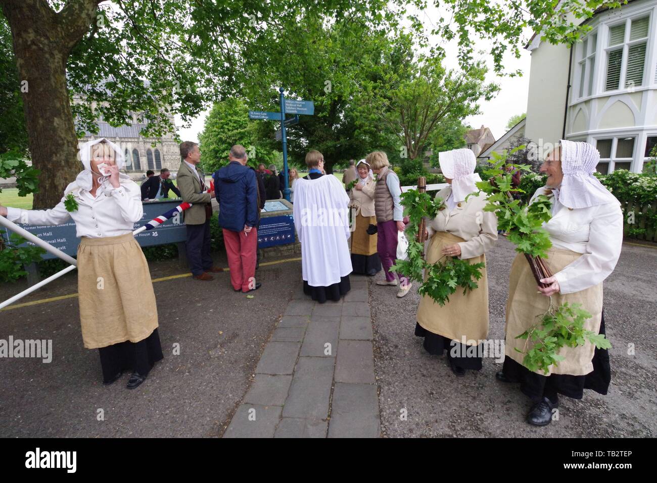 Oak Apple Day in Great Wishford 29th May 2019 where villagers reassert there ancient rights to gather wood from Grovely Wood. These rights date back to the middle ages and were confirmed by a forest court charter in 1603. Villagers also take part in a ceremony in Salisbury Cathedral, where this year Gaia features, a 120dpi detailed NASA imagery of the earth's surface. An art instilation by  by Luke Jerram. Stock Photo