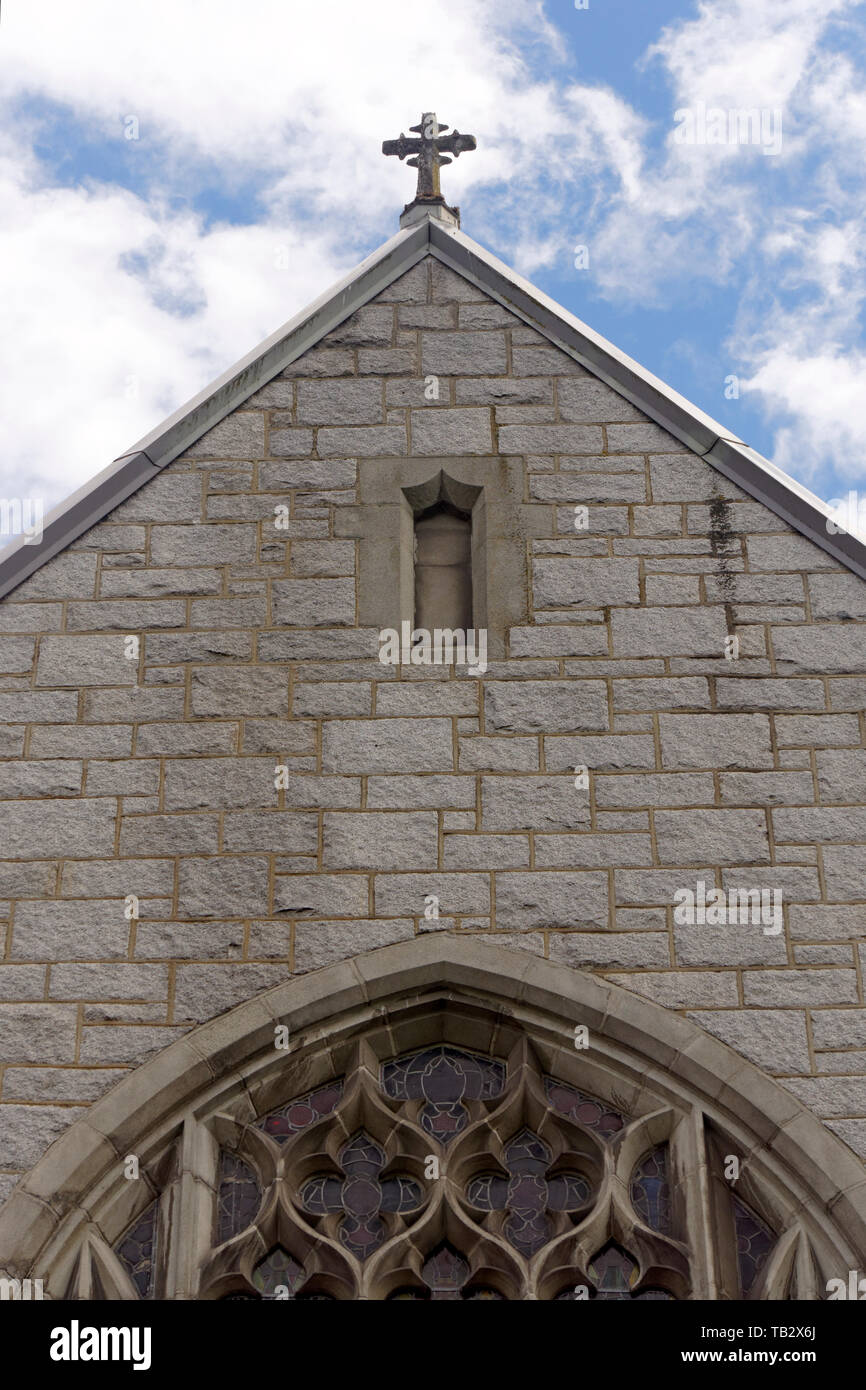 Detail of the stone facade of a Gothic style church Stock Photo