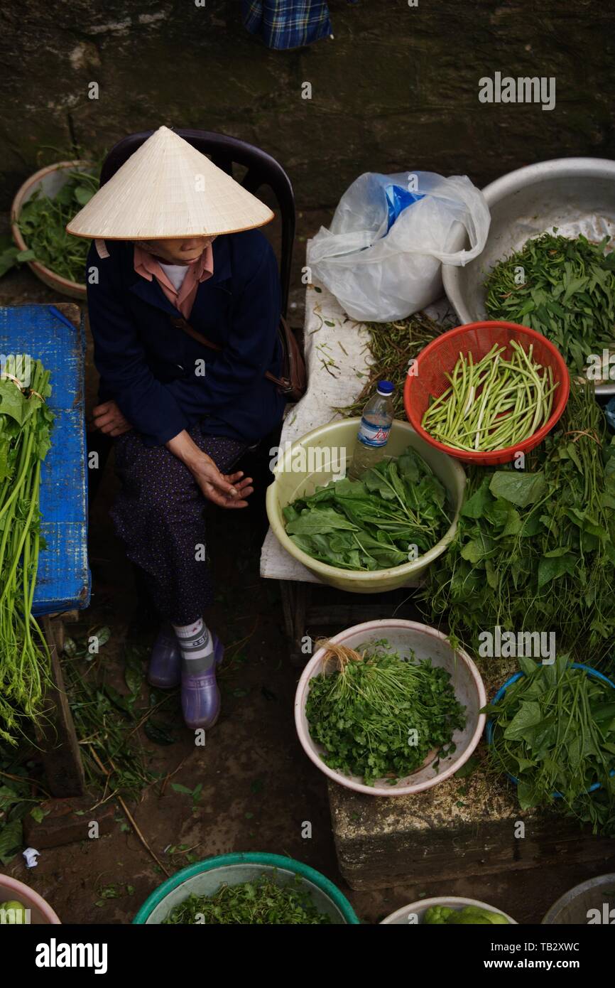 Woman selling herbs Stock Photo