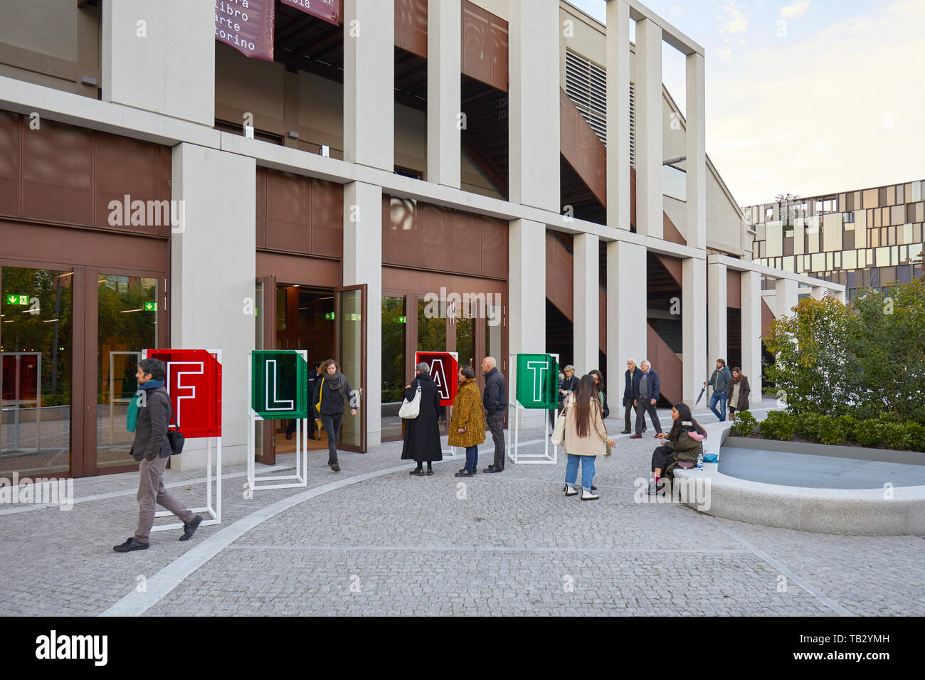 TURIN, ITALY - NOVEMBER 2, 2018: FLAT, art book fair entrance with people at Nuvola Lavazza building in Turin, Italy. Stock Photo