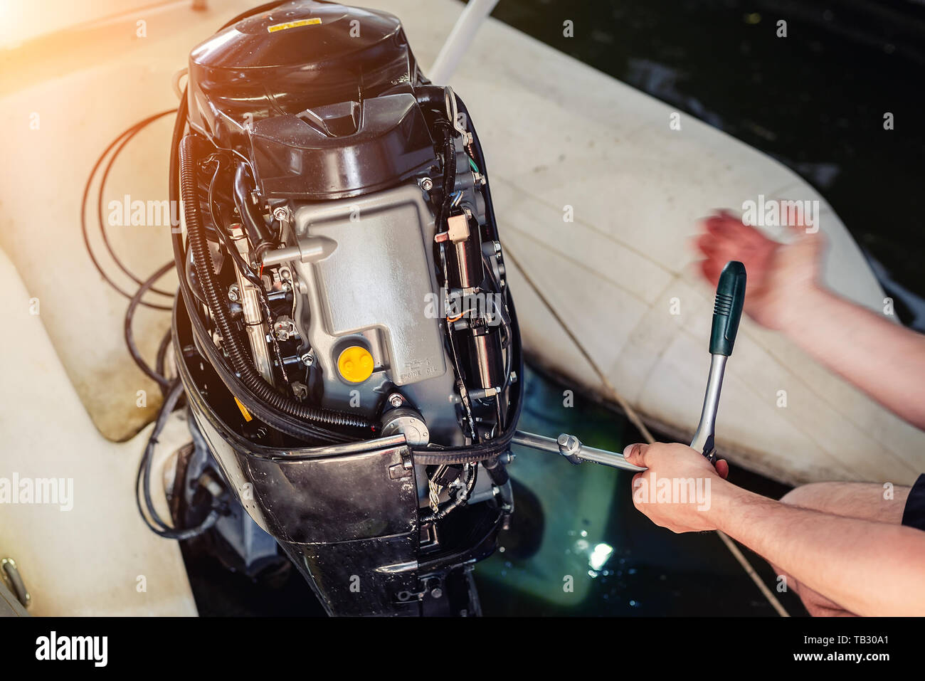 Repairing outboard hires stock photography and images Alamy