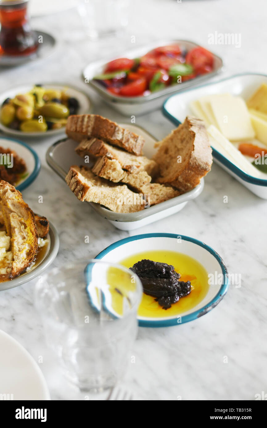 Turkish breakfast with various plates on a table Stock Photo