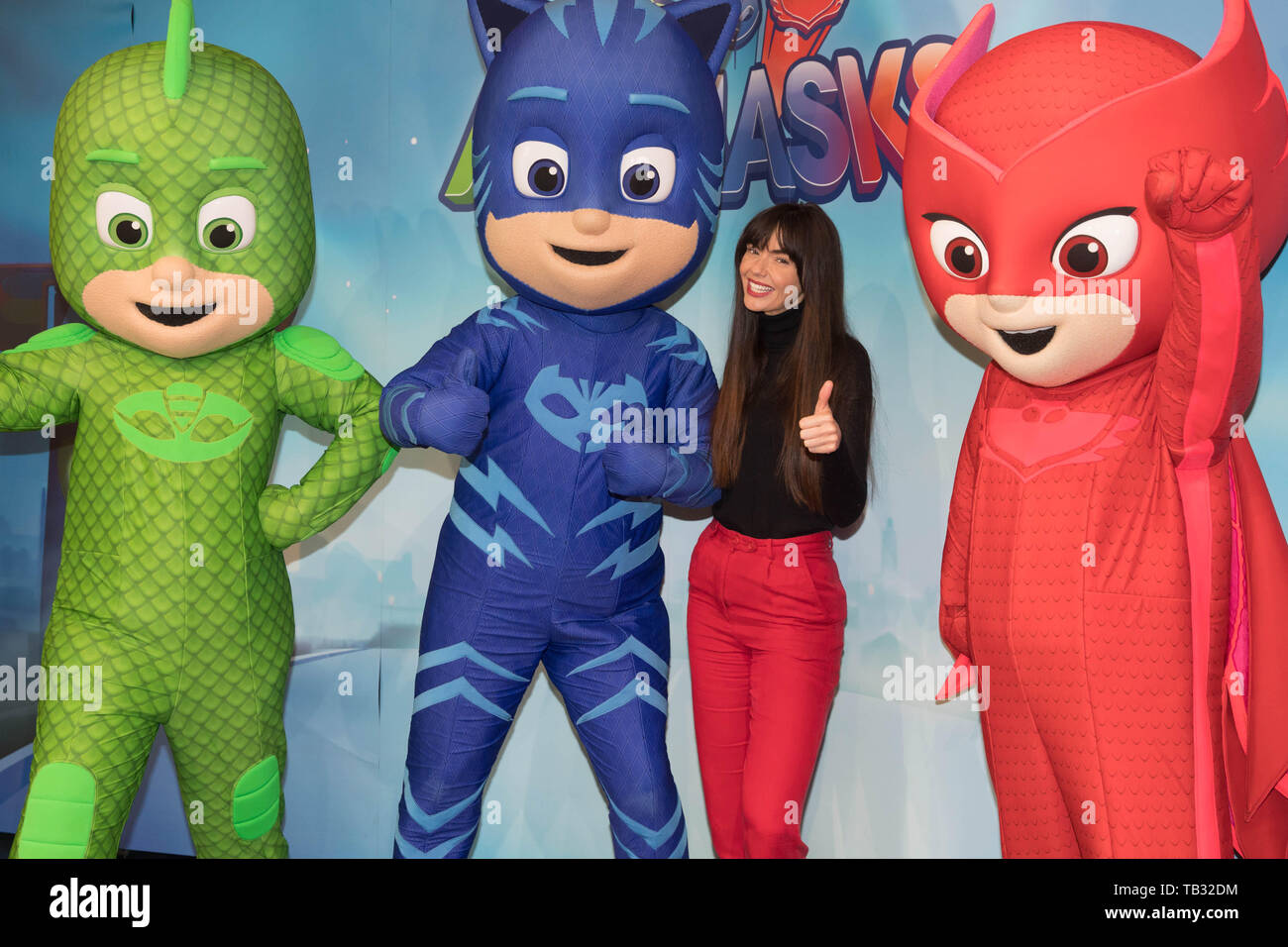 Jennifer Metcalfe at Hamleys to help PJ Masks to save the day... and  celebrate National Superhero Day. PJ Masks is a show about ordinary kids  who become pyjama-clad superheroes at night. Two