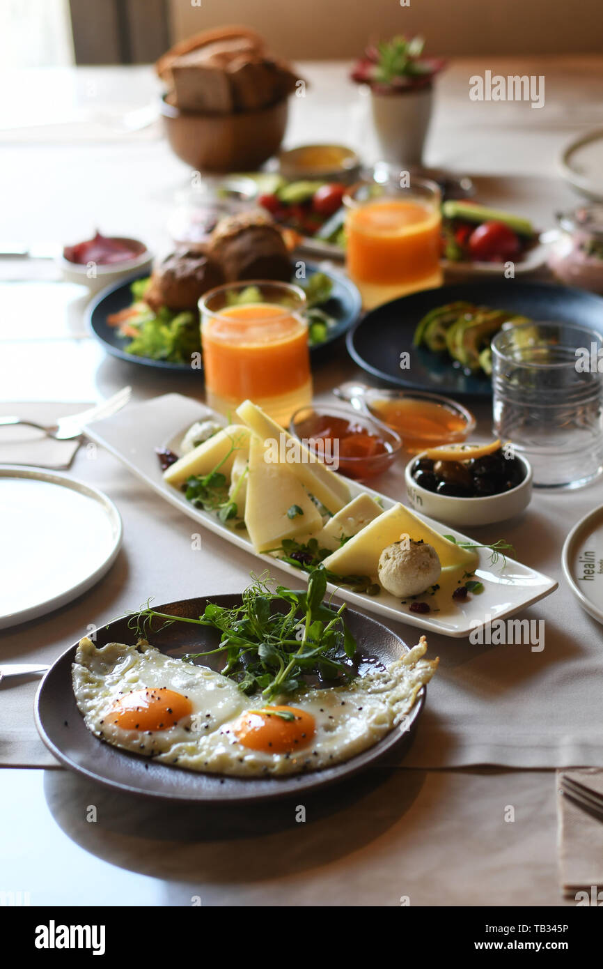 Turkish breakfast with various plates on a table Stock Photo
