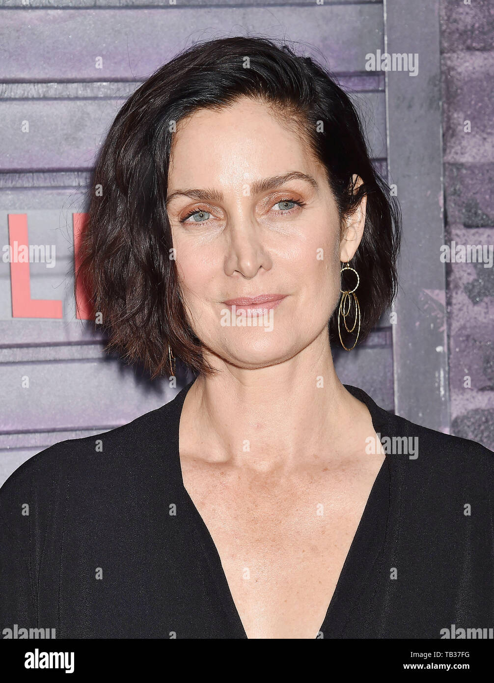 HOLLYWOOD, CA - MAY 28: Carrie-Anne Moss attends a Special Screening Of Netflix's 'Jessica Jones' Season 3 at ArcLight Hollywood on May 28, 2019 in Hollywood, California. © Joe Sutter, PacificCoastNews. Los Angeles Office (PCN): +1 310.822.0419 UK Office (Photoshot): +44 (0) 20 7421 6000 sales@pacificcoastnews.com FEE MUST BE AGREED PRIOR TO USAGE Stock Photo