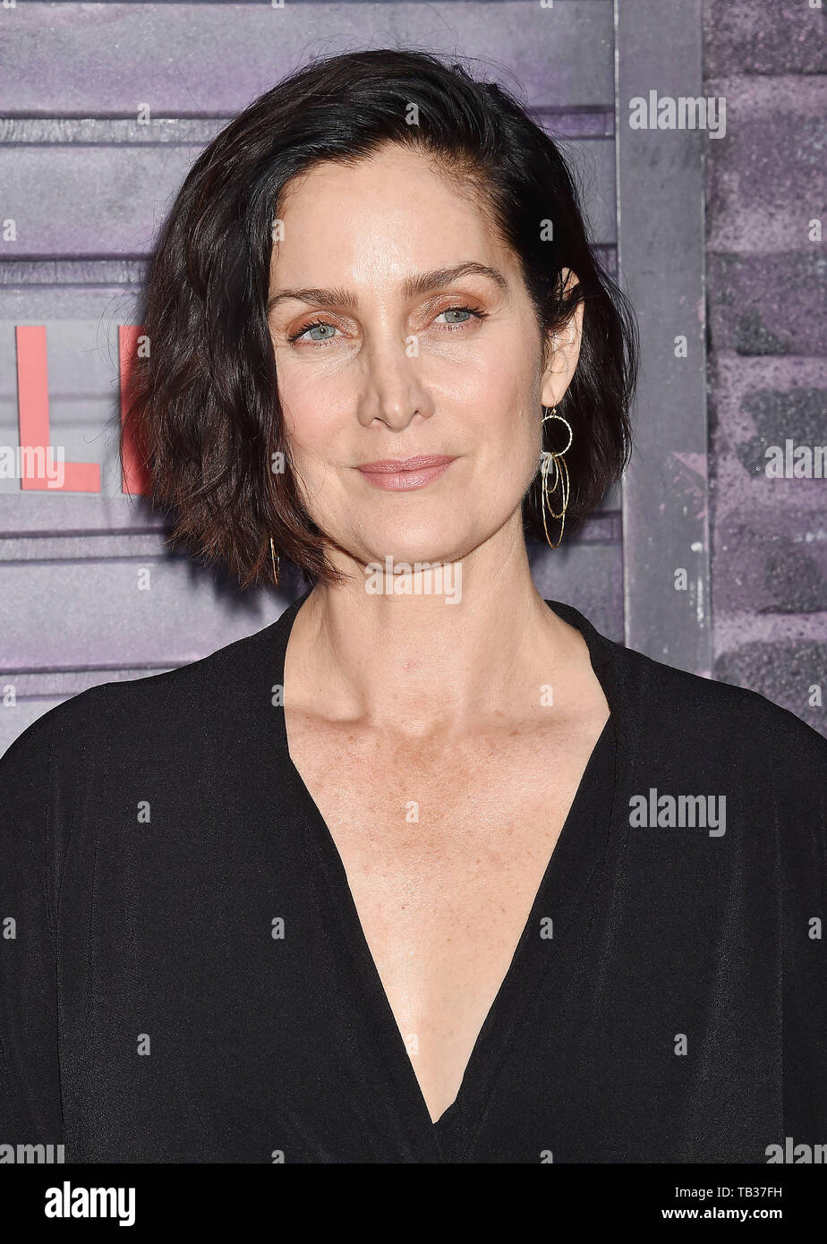 HOLLYWOOD, CA - MAY 28: Carrie-Anne Moss attends a Special Screening Of Netflix's 'Jessica Jones' Season 3 at ArcLight Hollywood on May 28, 2019 in Hollywood, California. © Joe Sutter, PacificCoastNews. Los Angeles Office (PCN): +1 310.822.0419 UK Office (Photoshot): +44 (0) 20 7421 6000 sales@pacificcoastnews.com FEE MUST BE AGREED PRIOR TO USAGE Stock Photo