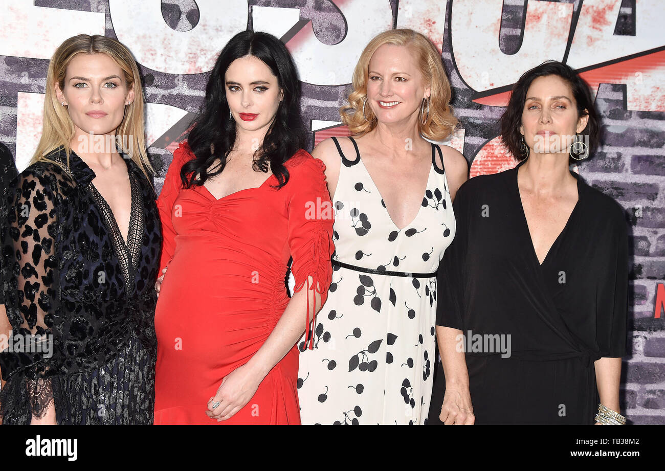 HOLLYWOOD, CA - MAY 28: (L-R) Rachael Taylor, Krysten Ritter, Melissa Rosenberg and Carrie-Anne Moss attend a Special Screening Of Netflix's 'Jessica Jones' Season 3 at ArcLight Hollywood on May 28, 2019 in Hollywood, California. Stock Photo