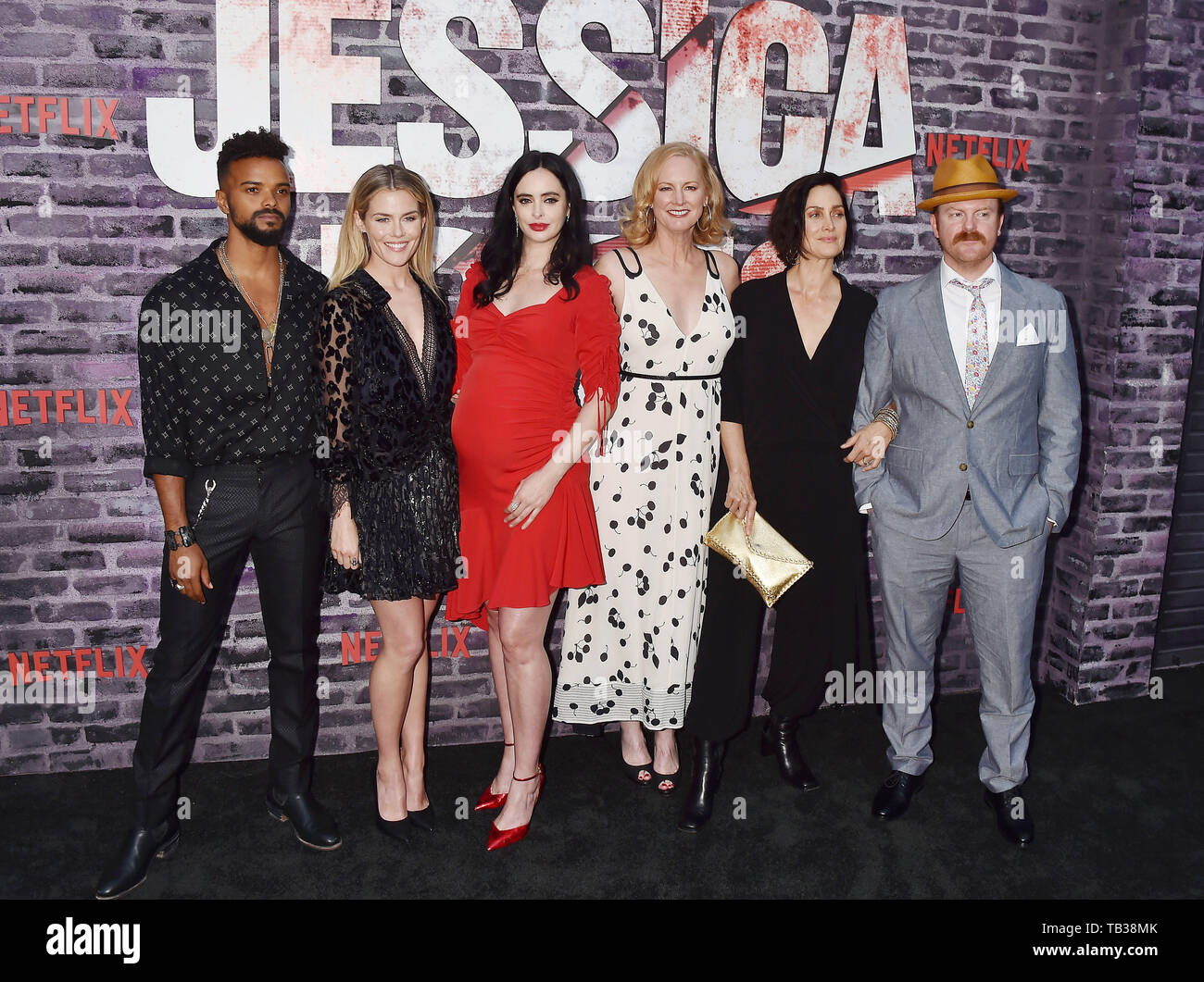 HOLLYWOOD, CA - MAY 28: (L-R) Eka Darville, Rachael Taylor, Krysten Ritter, Melissa Rosenberg, Carrie-Anne Moss and Jeremy Bobb attend a Special Screening Of Netflix's 'Jessica Jones' Season 3 at ArcLight Hollywood on May 28, 2019 in Hollywood, California. Stock Photo